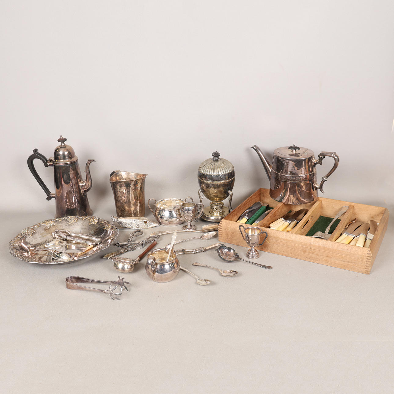 A COLLECTION OF SILVER-PLATED WARE (QTY).