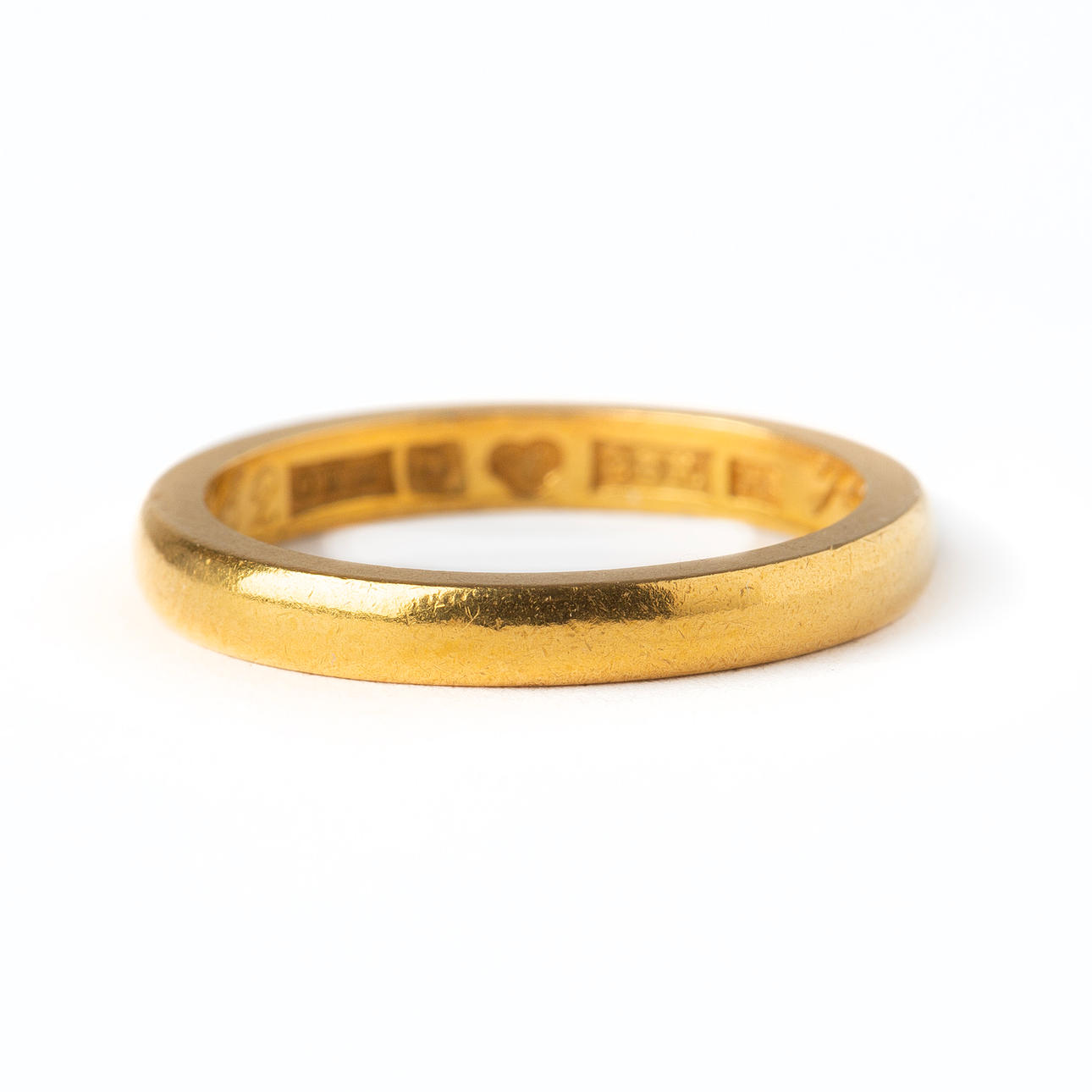 A 23K gold ring.