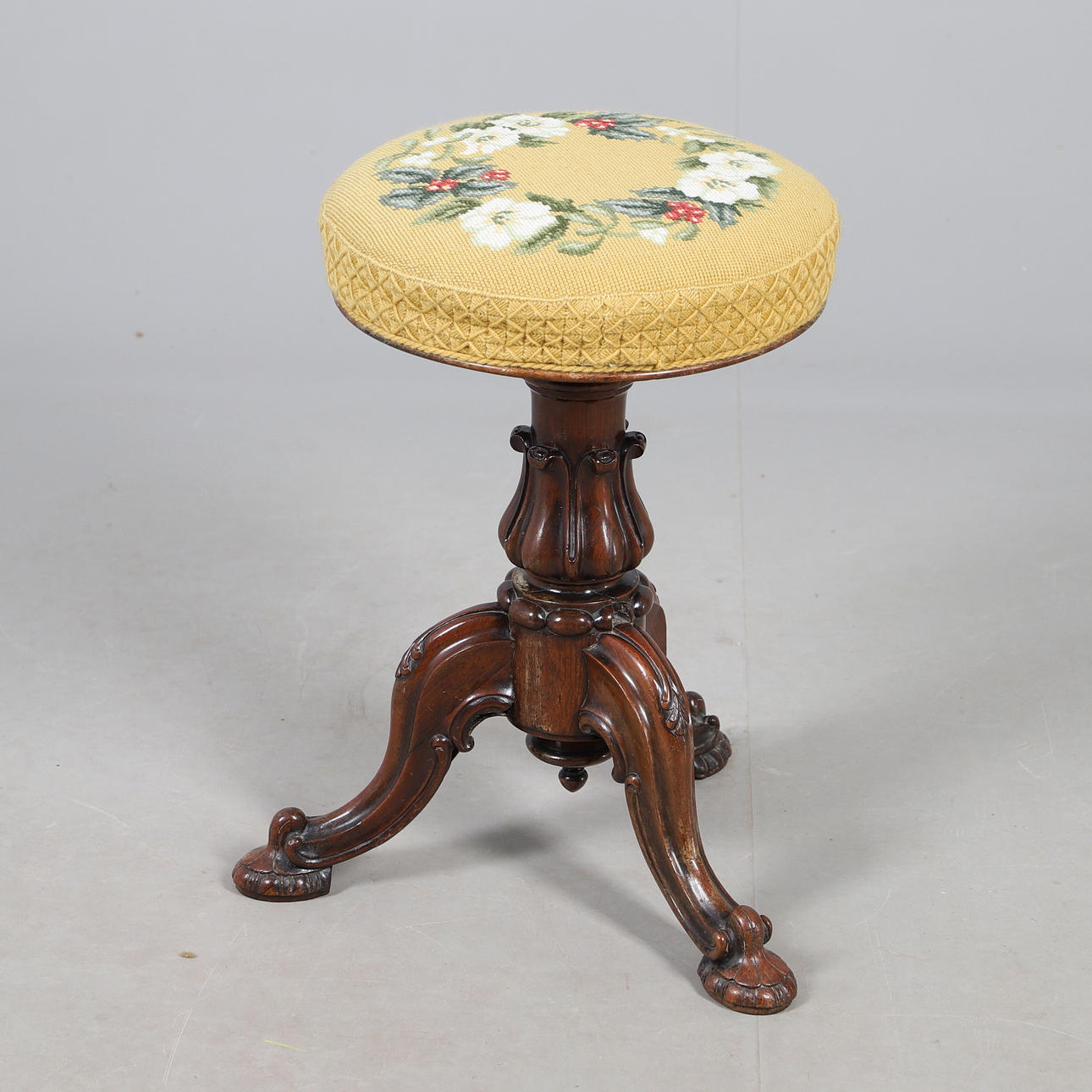 A WILLIAM IV PIANO STOOL.