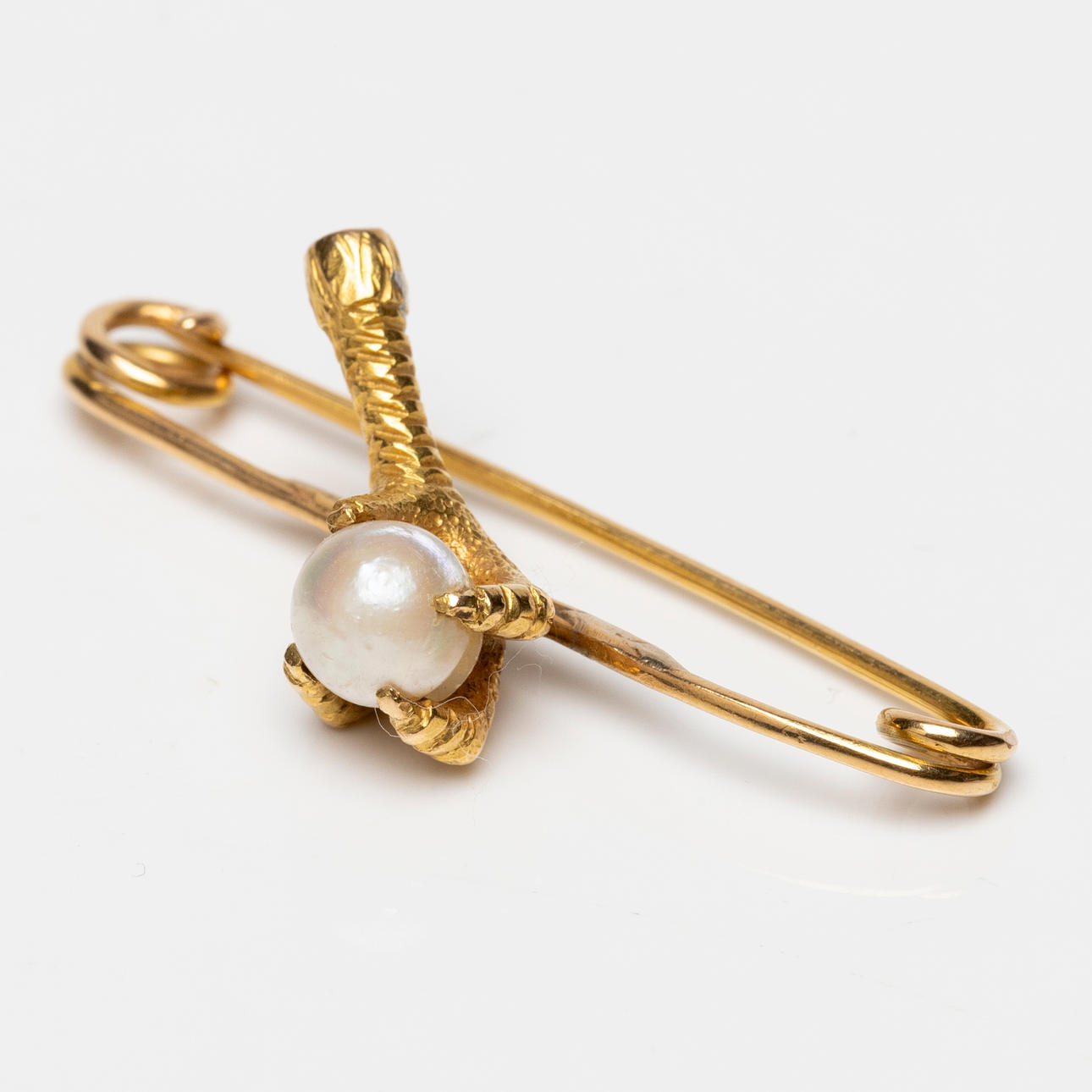 BROSCH, guld, 18K samt pärla.