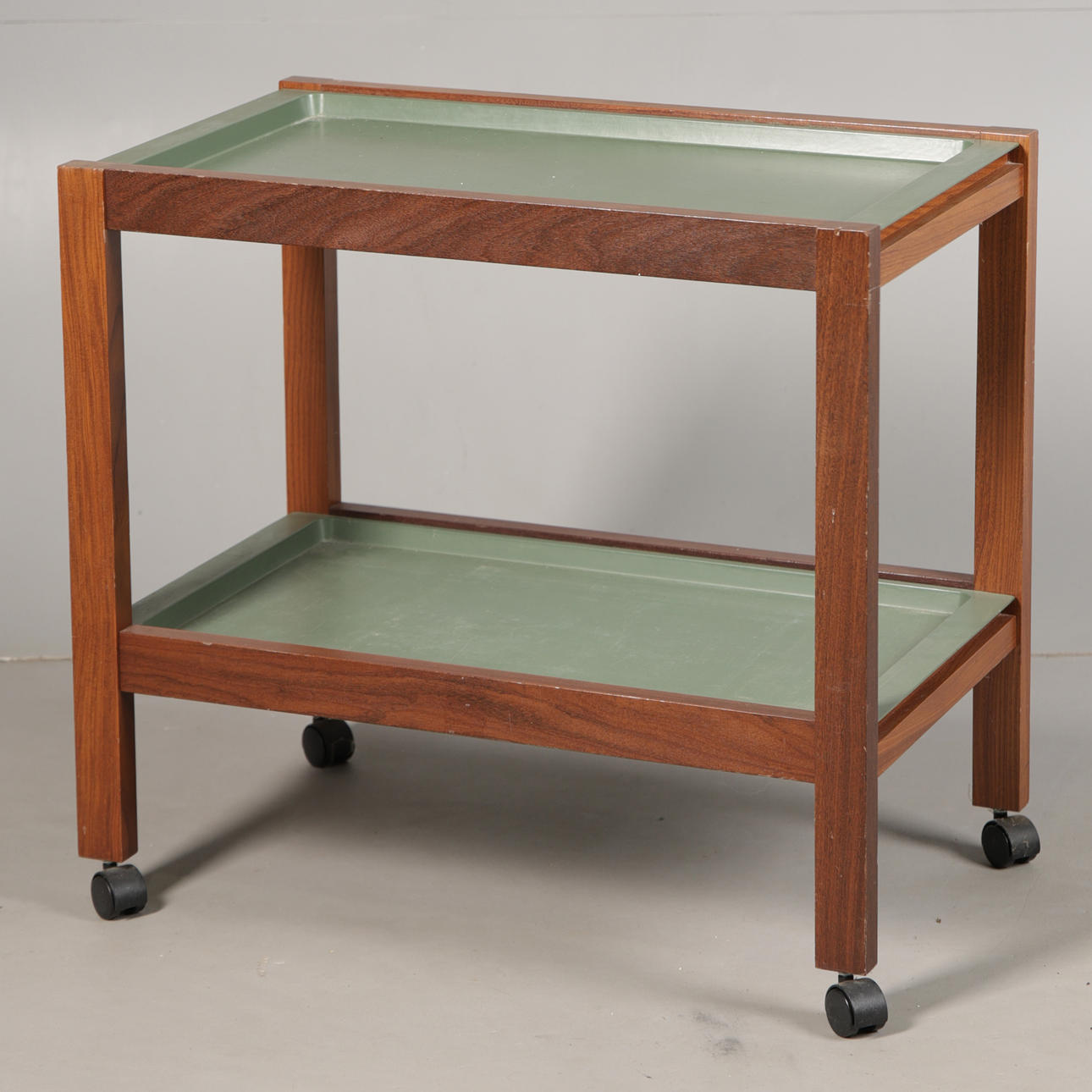 A WAR DEPARTMENT TEAK TWO-TIER TEA TROLLEY.