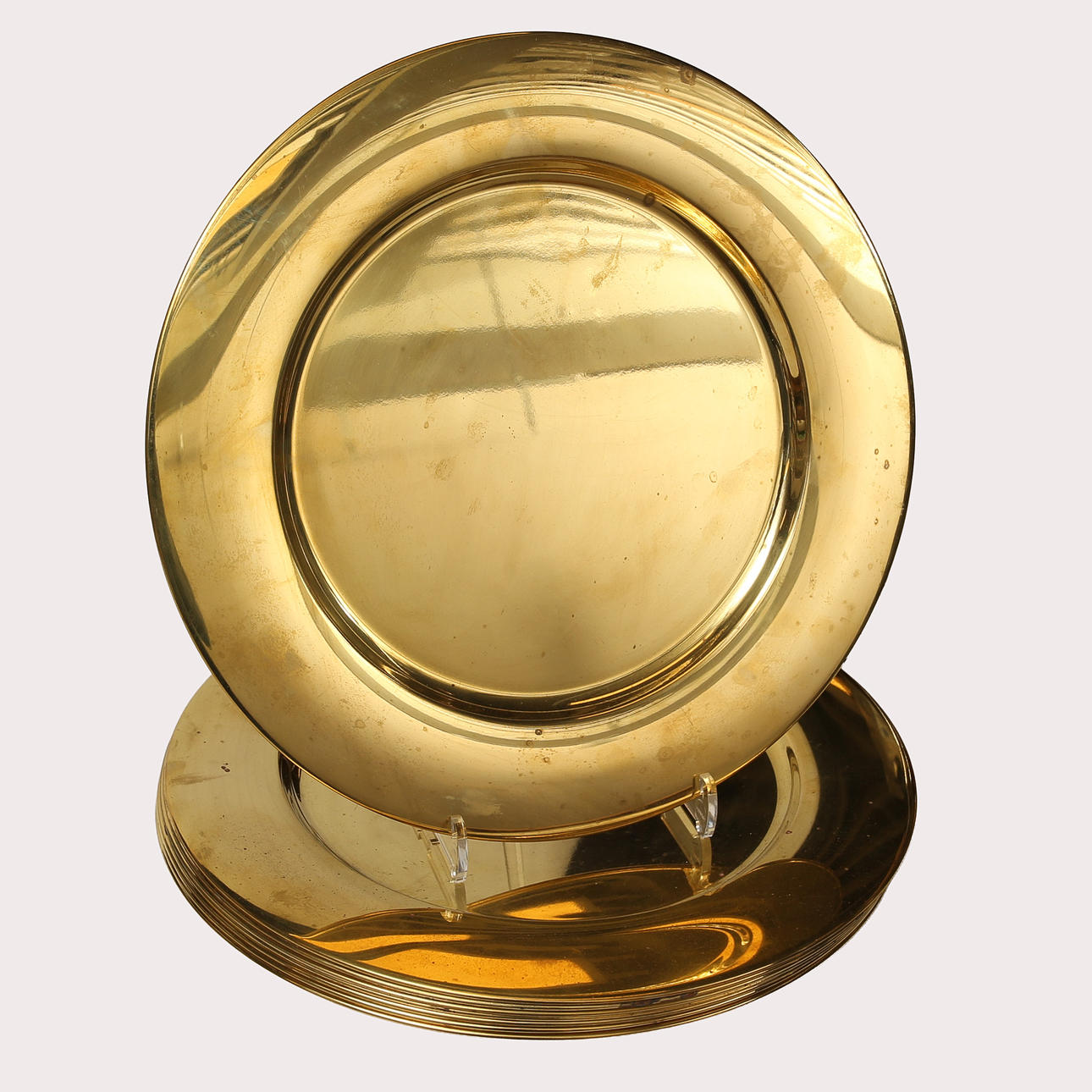 8-piece Stelton Envelope Plates, brass.