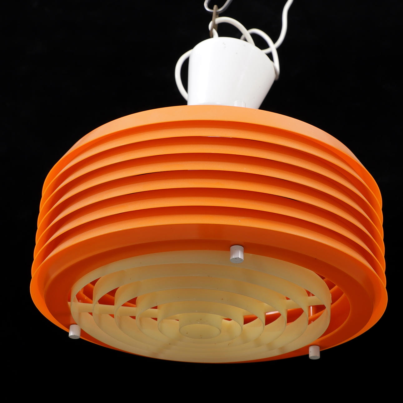 A ceiling lamp, orange plastic, 1960/70's.