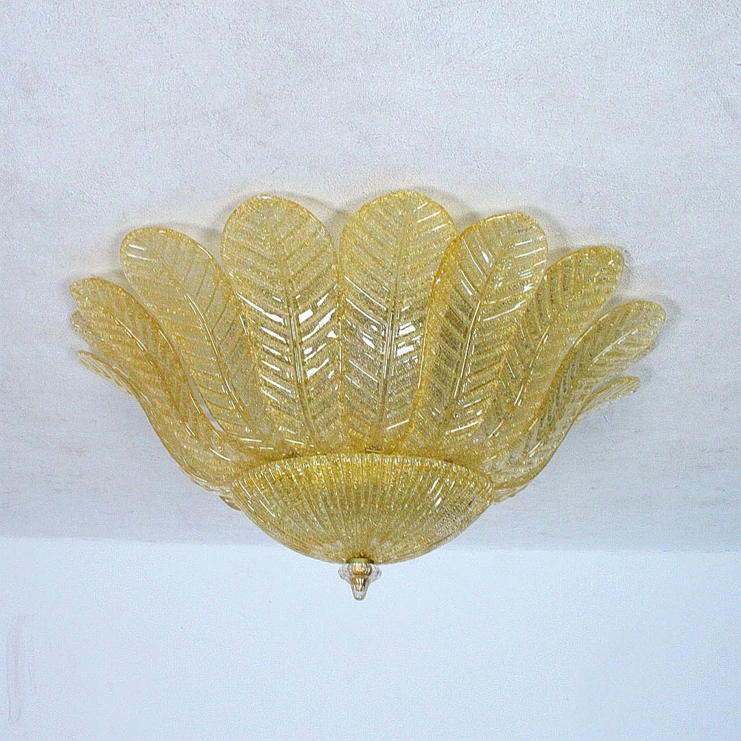 Large ceiling lamp with melted gold dust.
