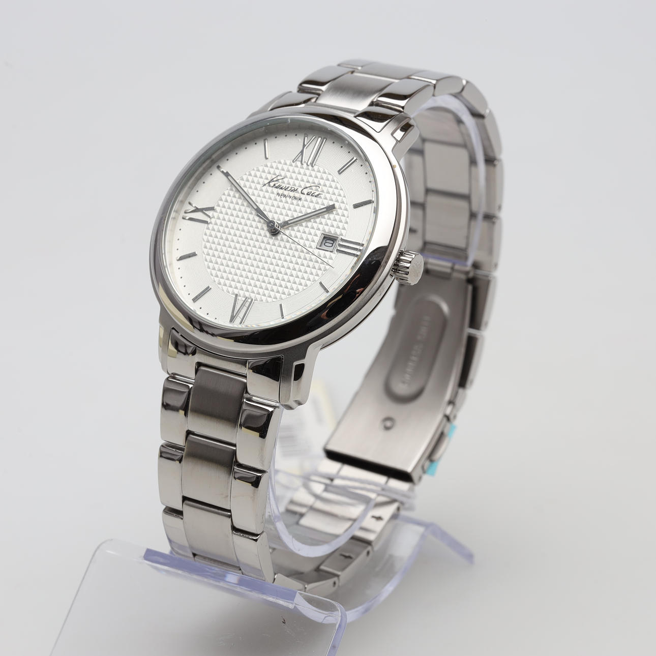A quartz wristwatch, Kenneth Cole.