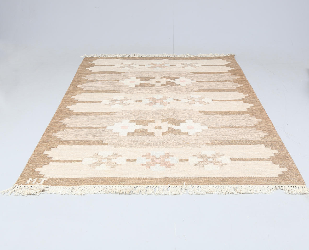 A CARPET, wicker linen, Sweden, signed MJ.