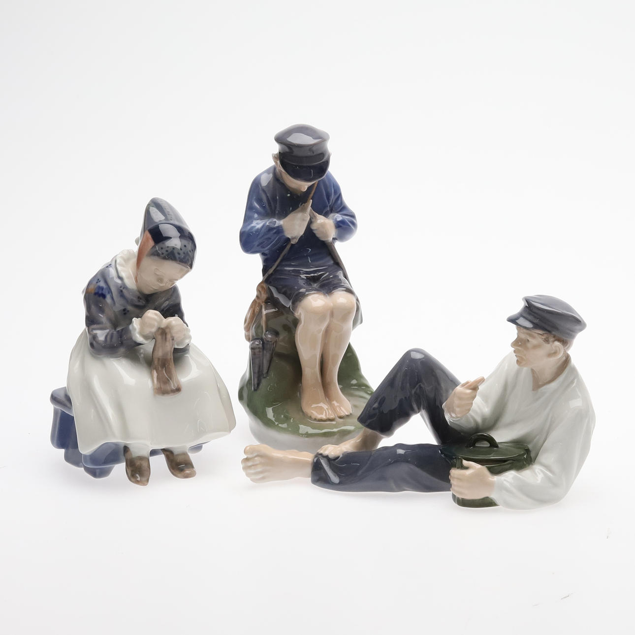 Three porcelain figurines, Royal Copenhagen, Denmark.