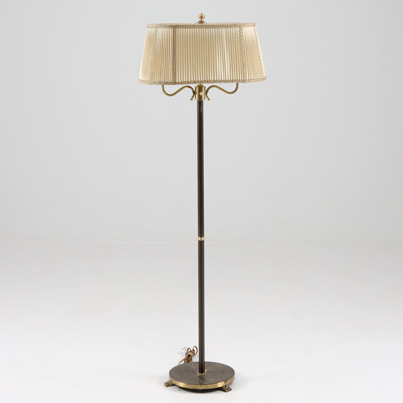 A metal frame floor lamp, mid 20th century.