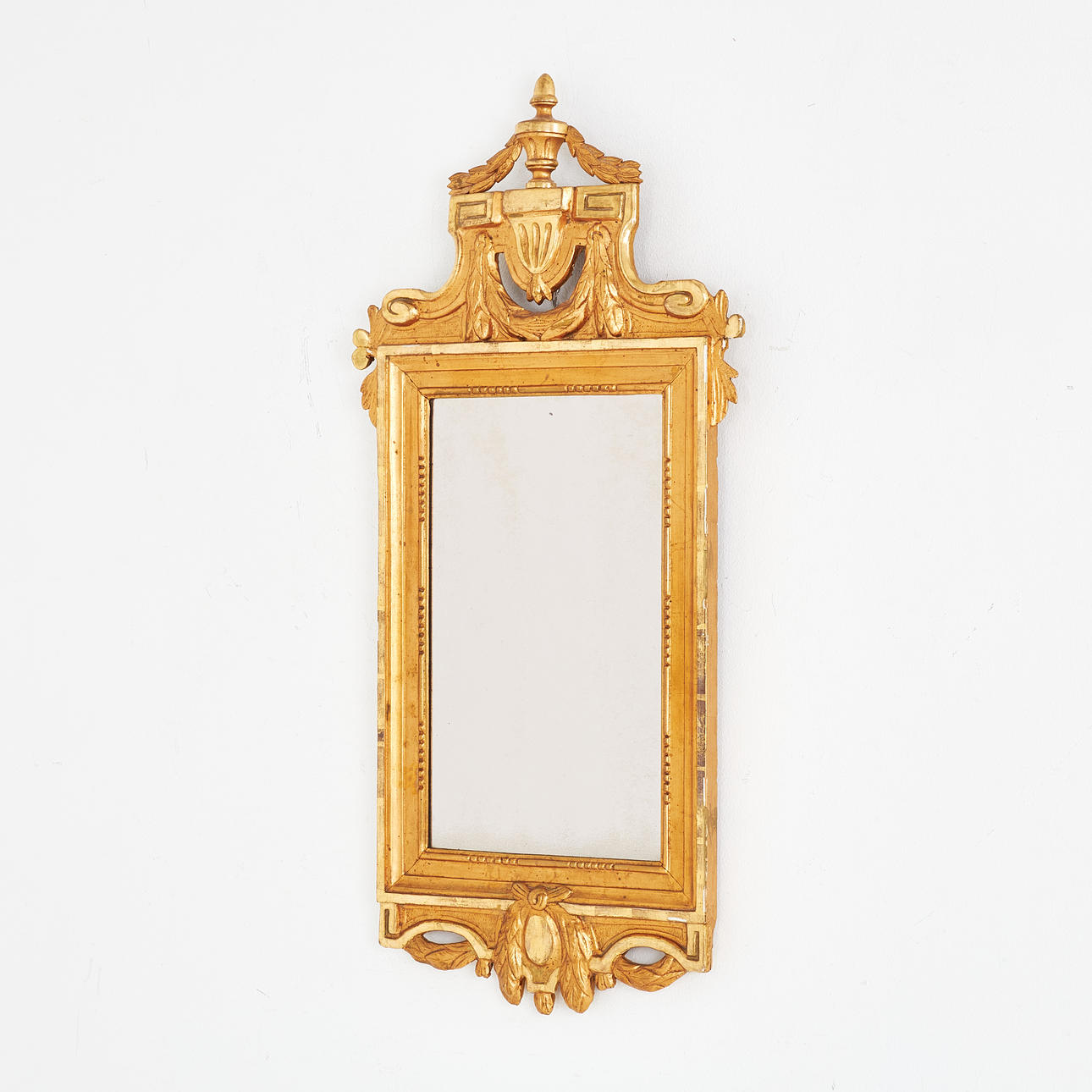 A mirror, Gustavian Stockholm work, hallmarked.