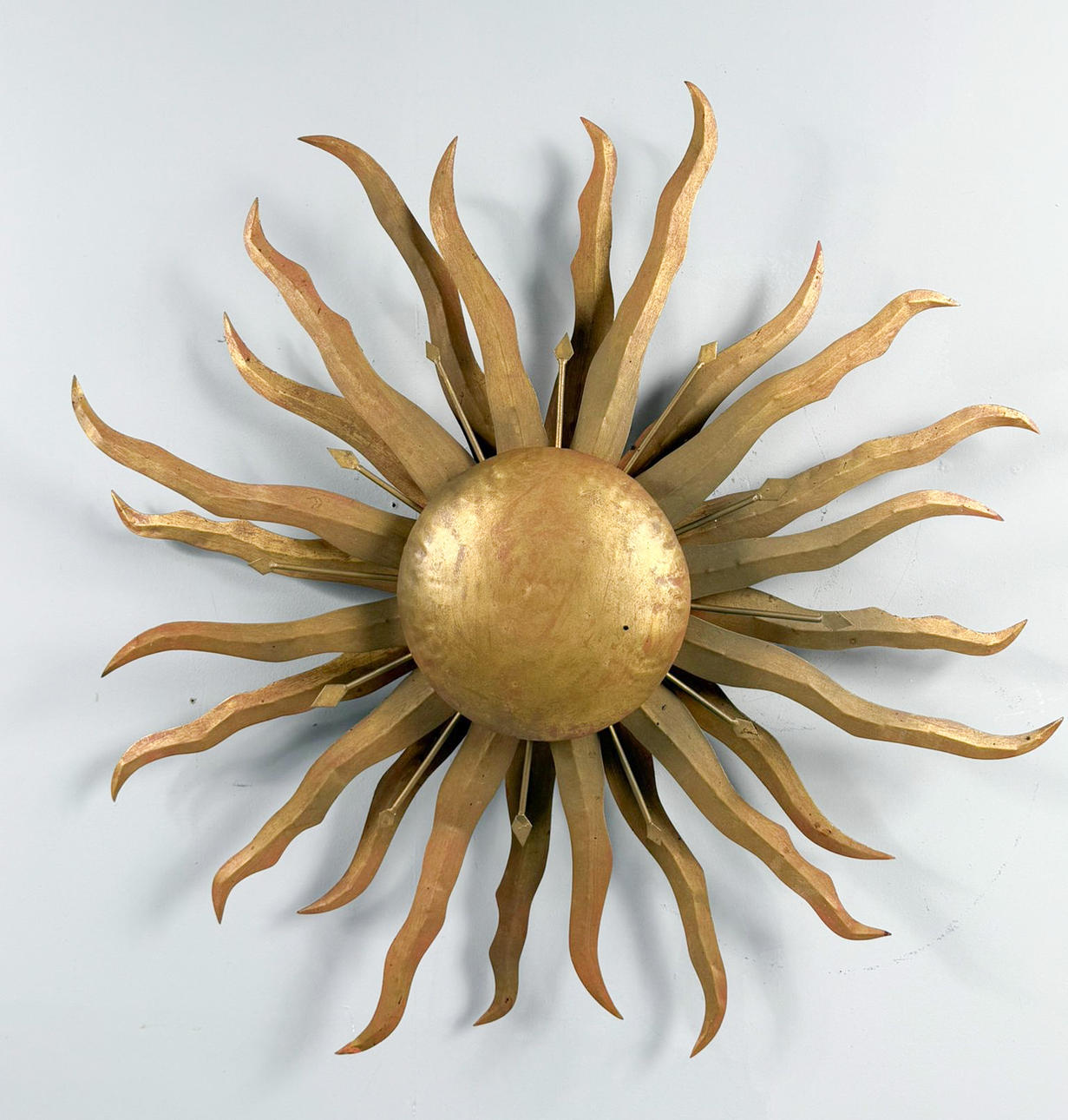Sunburst wall/ceiling lamp.