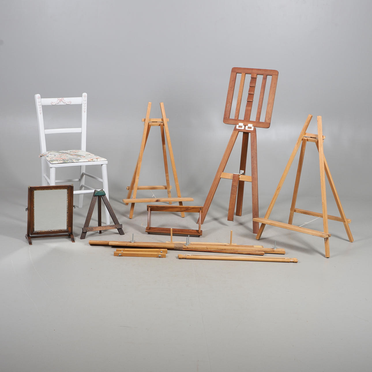 A GEORGE III SWING FRAME MIRROR AND OTHERS.