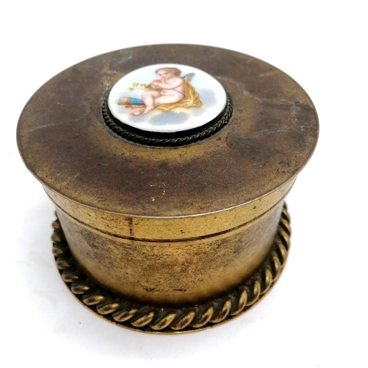 ANTIQUE ORMOLU BRASS BOX WITH CHERUB PORCELAIN PANEL.