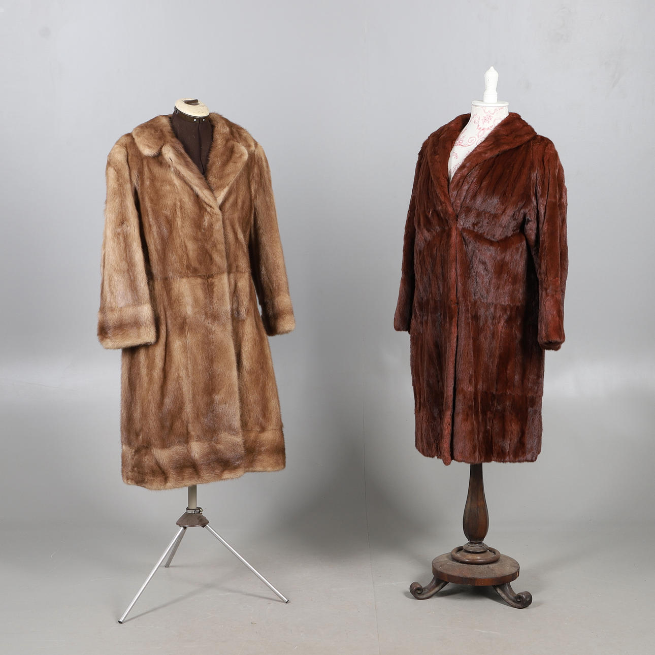 TWO LONG FUR COATS.