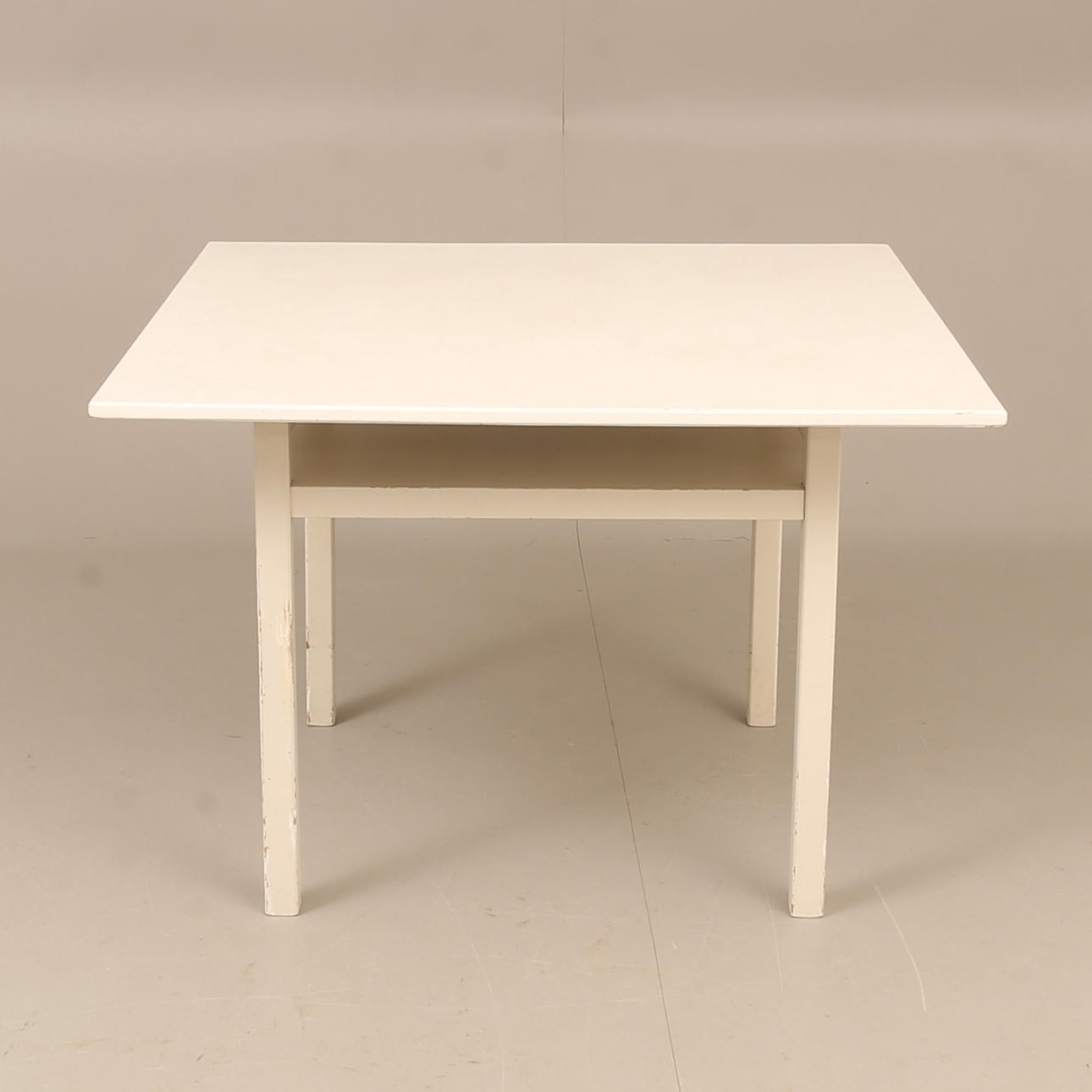 A 20th century table attributed to Erik Chambert.