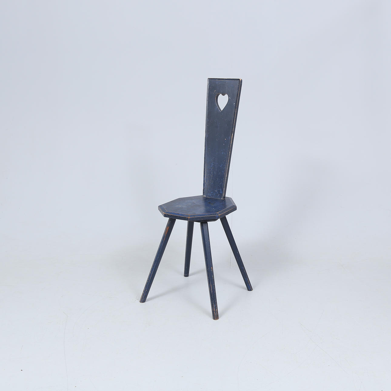 A painted chair, circa 1900.