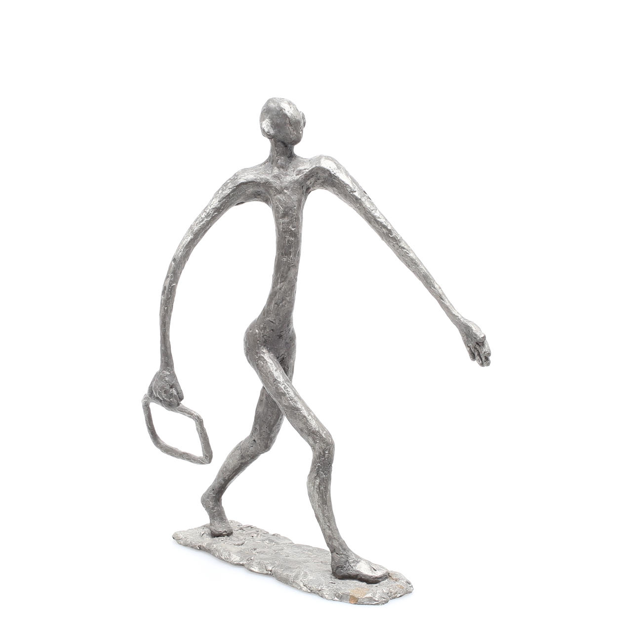 INA KATARINA STRÖMBERG. Skulptur, tenn, "Man walking" signerad Ina.