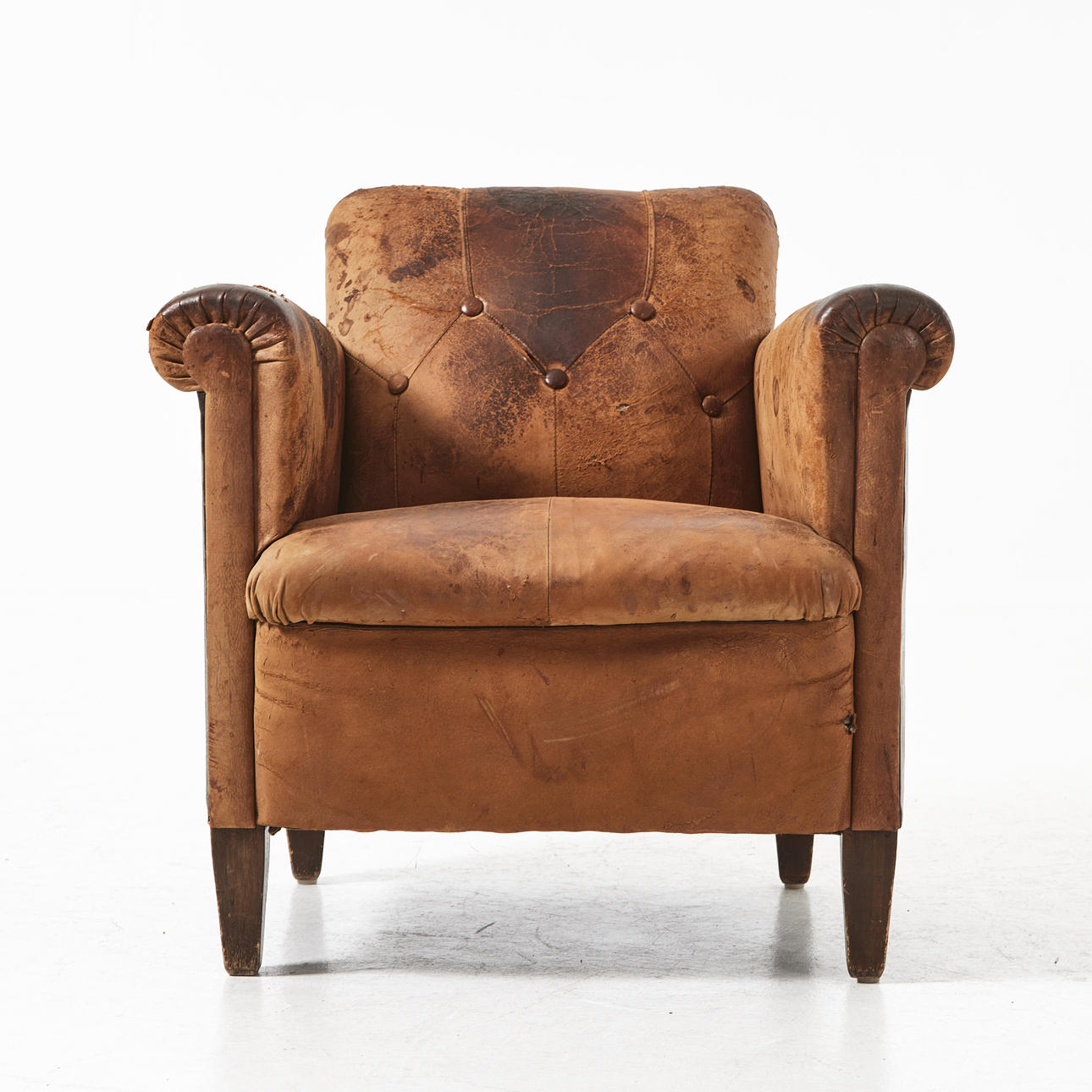 Armchair, club model, leather, deep stitched back.