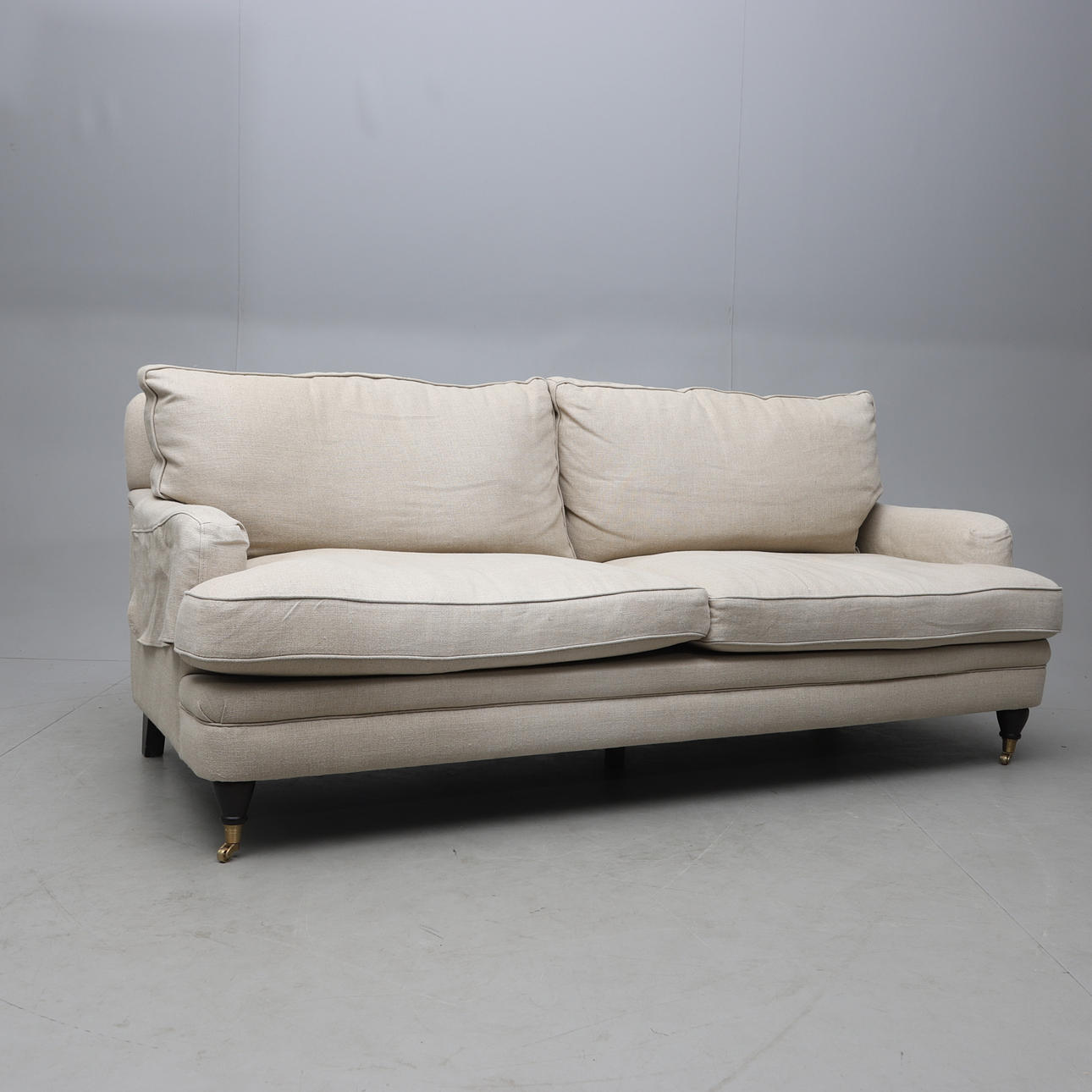 A Howard model sofa with textile upholstery, 2000's.