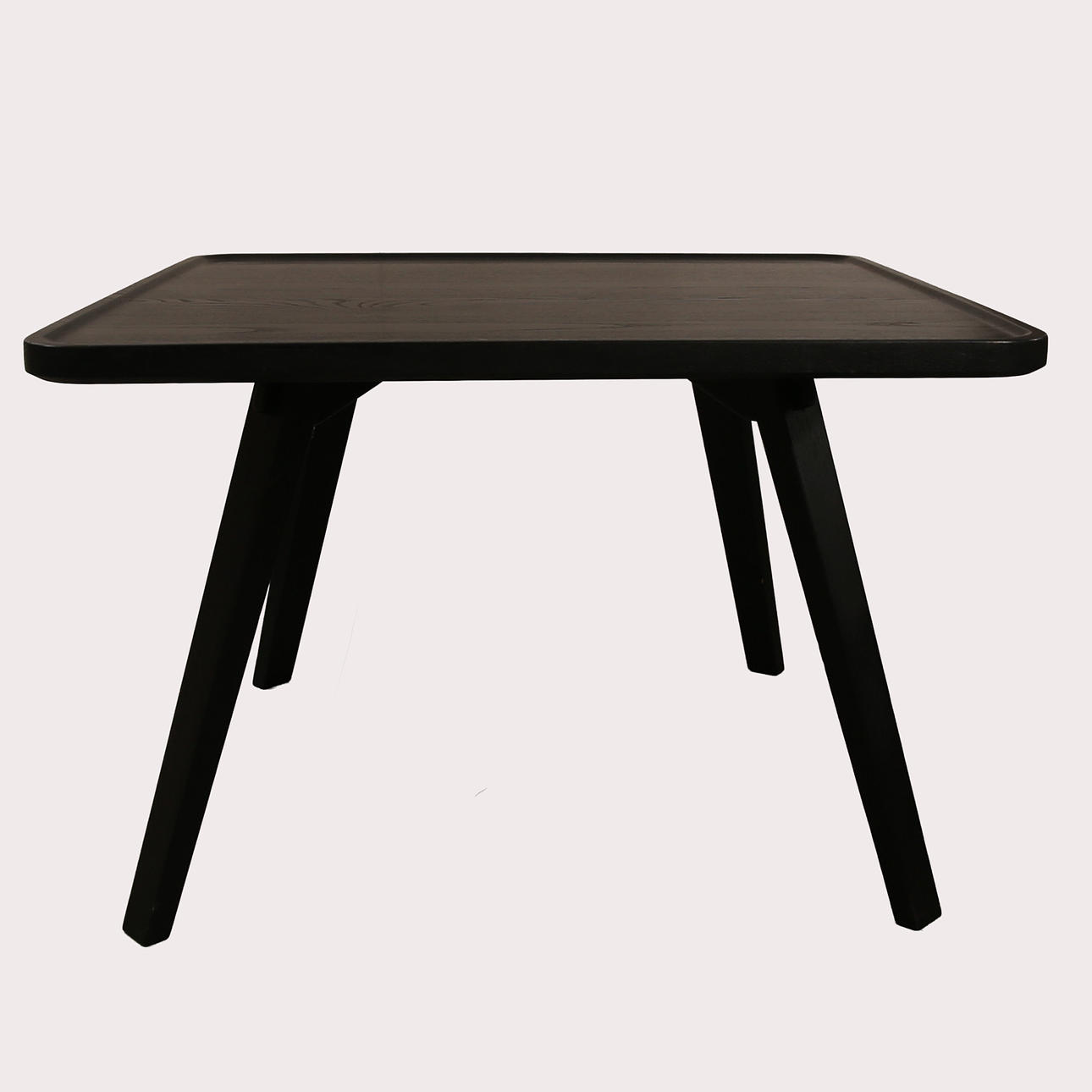 ROGER PERSSON. Coffee table, “Mill for Karl Andersson &Söner, black lacquered box, slanted legs.