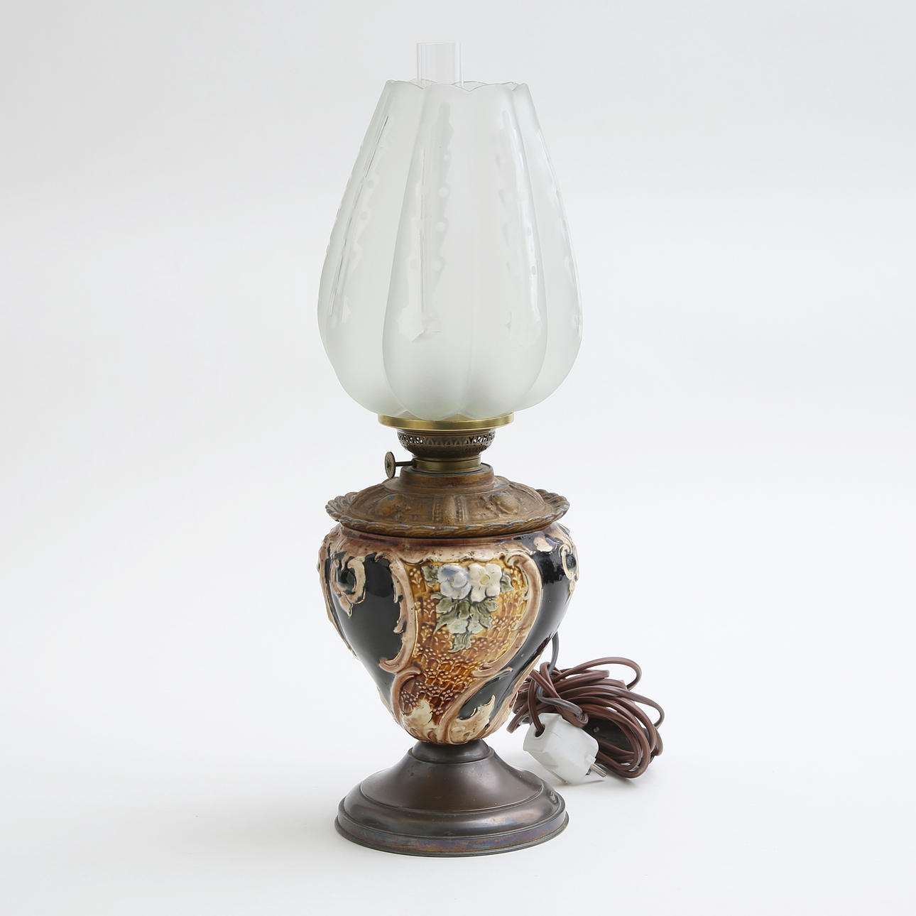 A reworked kerosene table lamp, 20th century.