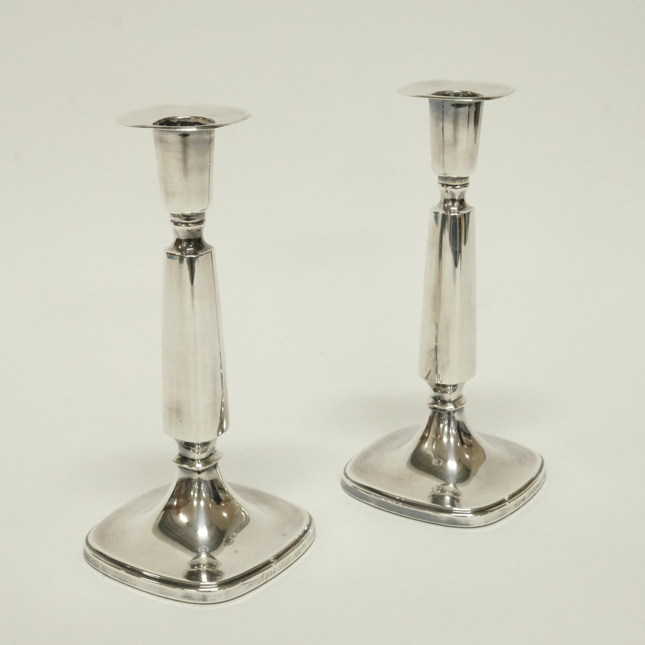 PAIR OF SILVER CANDLESTICKS.