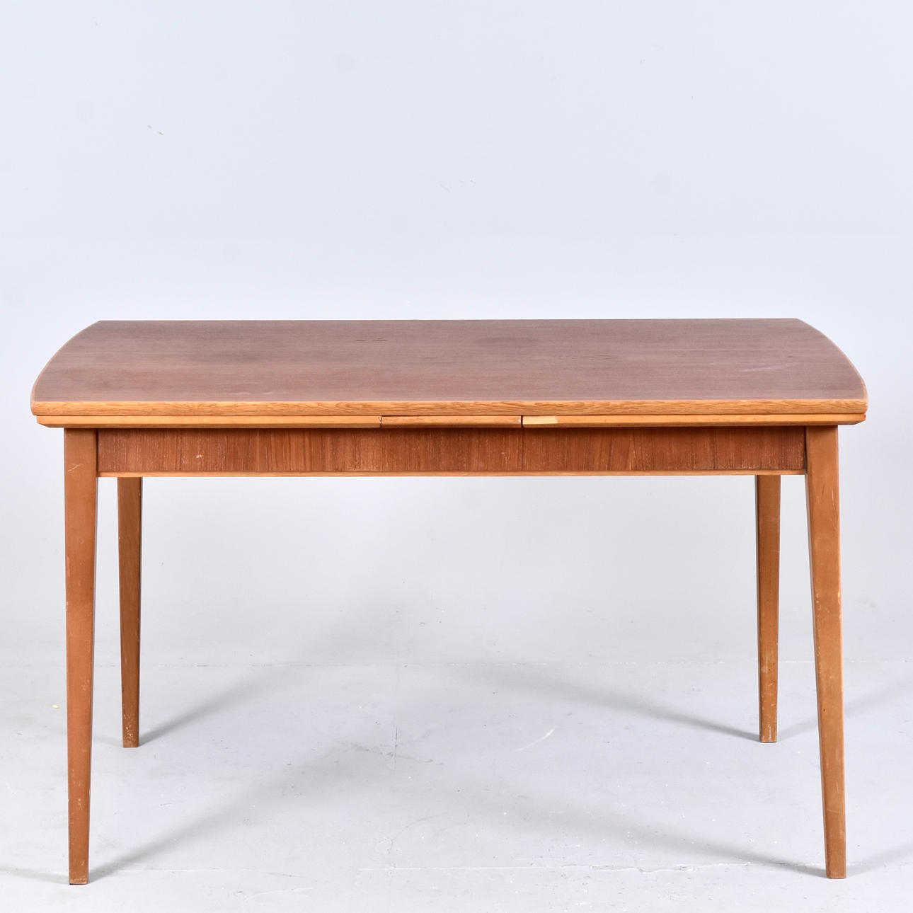 DINING TABLE with 2 inserts, teak and oak, 1960's.