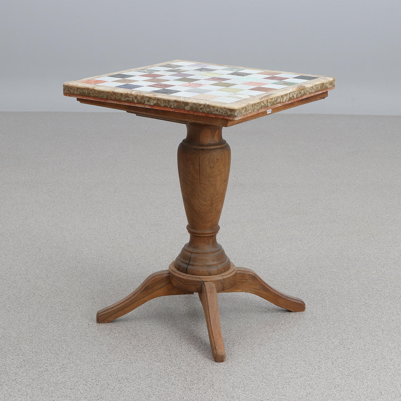 CHESSBOARD. Walnut with stone top. 20th century.