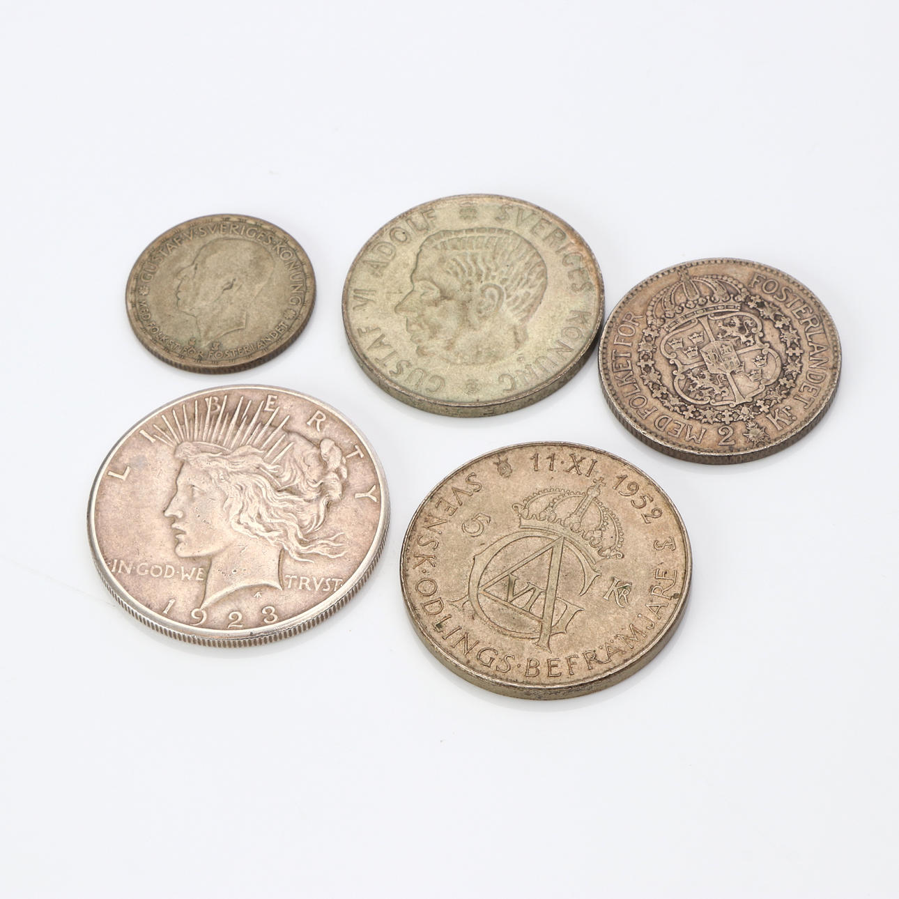 COINS, FIVE PCS. It's silver. Weight about 90 grams.