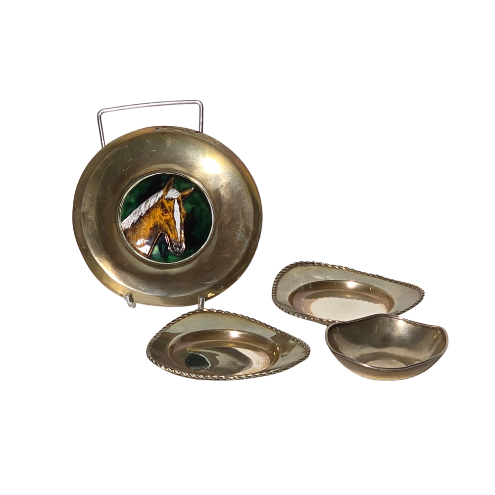 4 PUNCHED SILVER TRAYS.