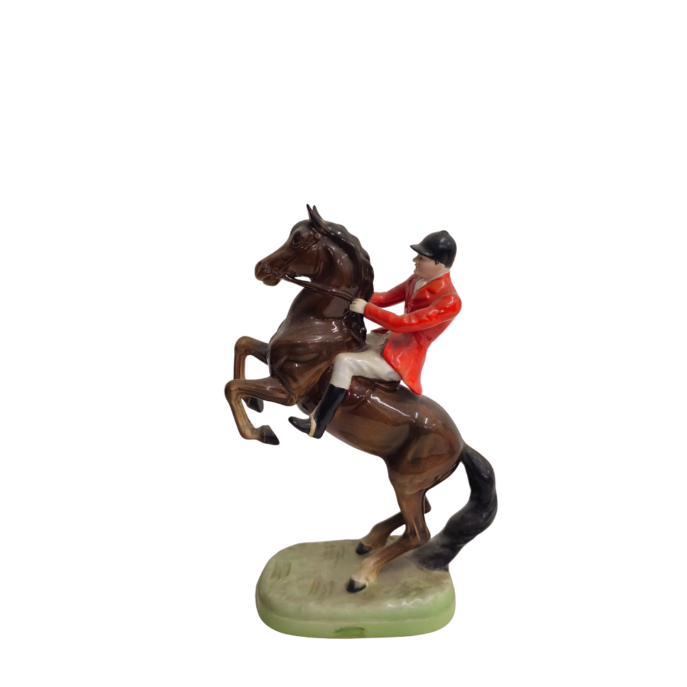 BESWICK ENGLAND. RIDER PREPARING FOR THE JUMP.