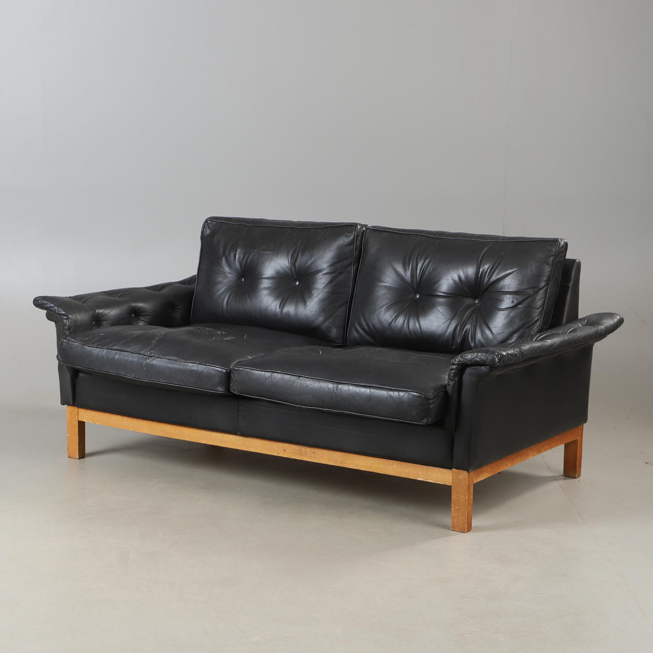 A mid-20th century IKEA leather “Cardinal” sofa.