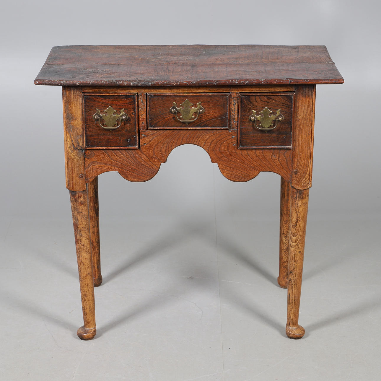 A GEORGE III ELM LOWBOY.
