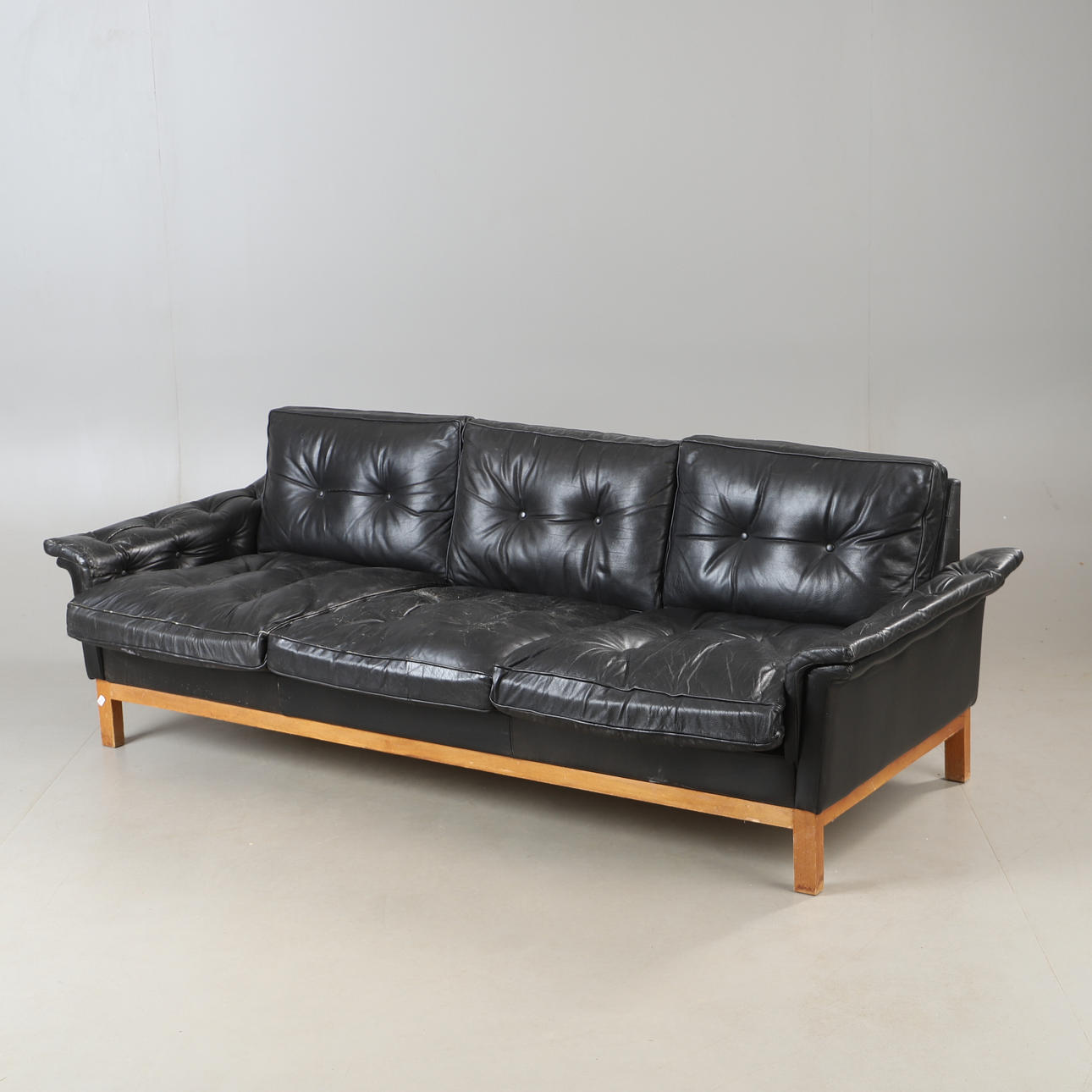 A mid-20th century IKEA leather “Cardinal” sofa.