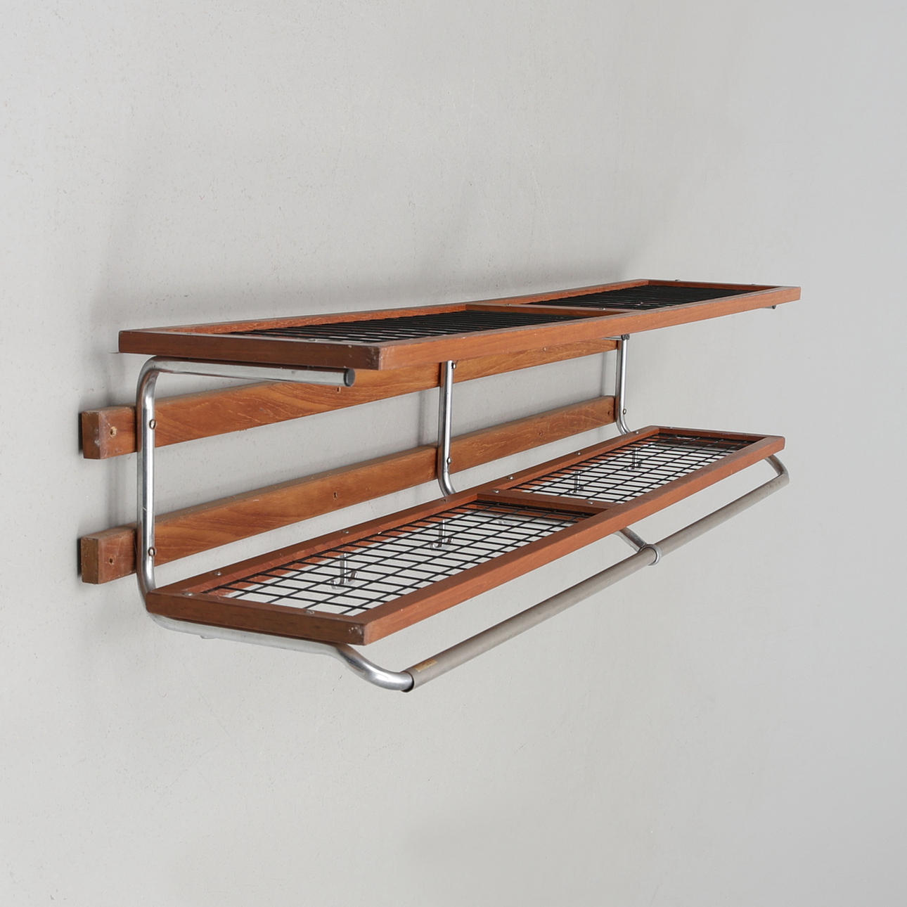 HAT SHELF. “Essem”, teak, metal.