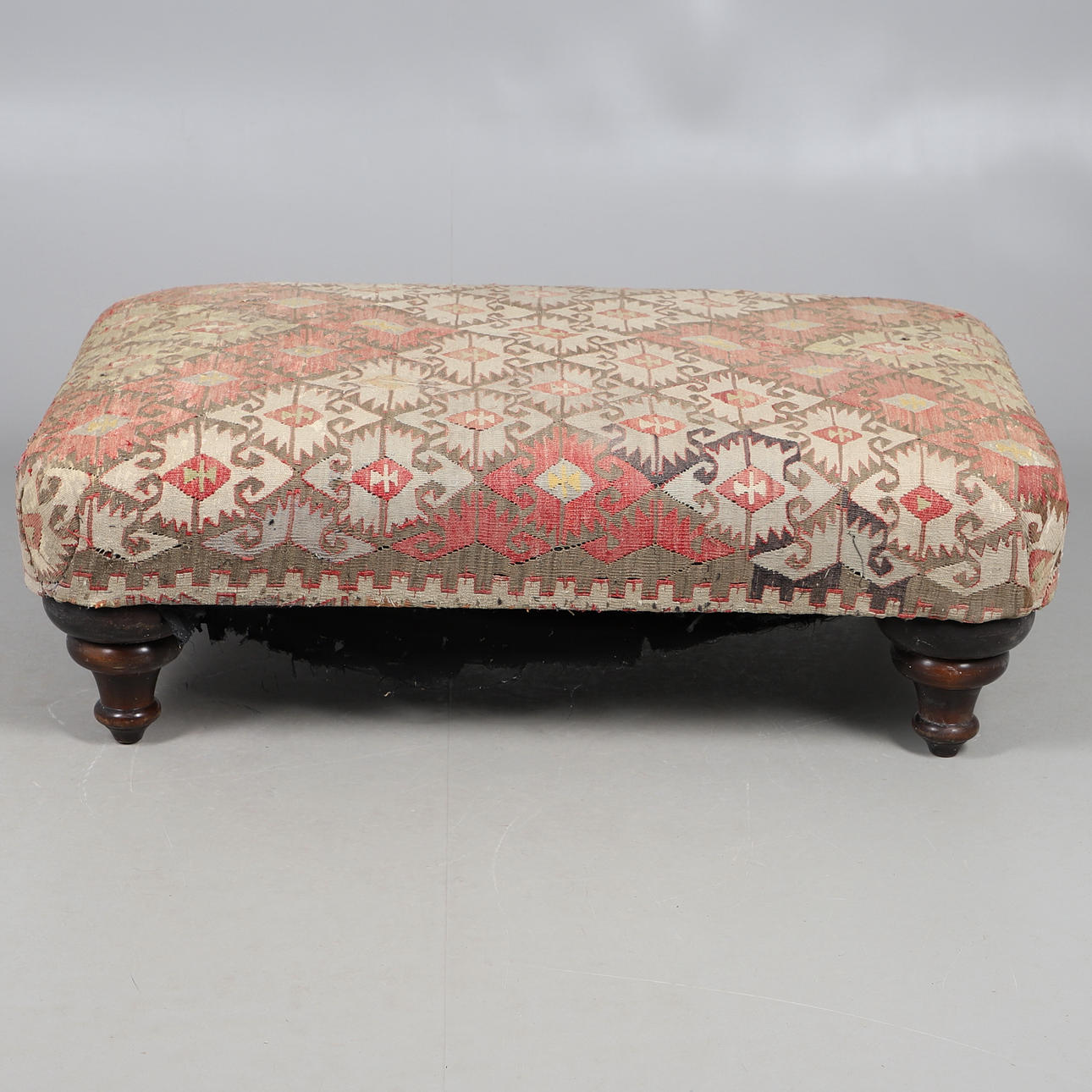 A GEORGE SMITH KELIM COVERED HEARTH STOOL.