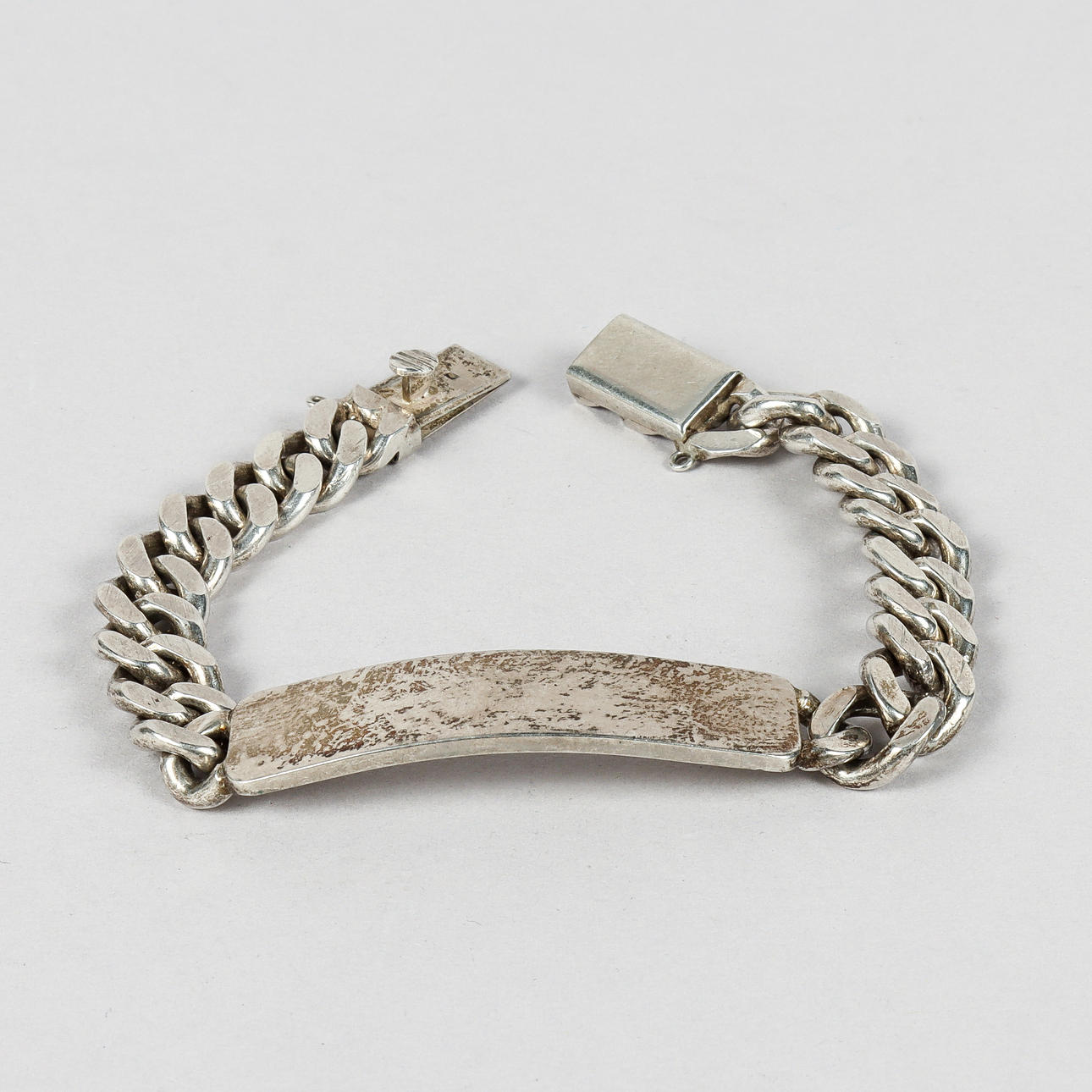 BRACELET silver, armored bracelet with badge.