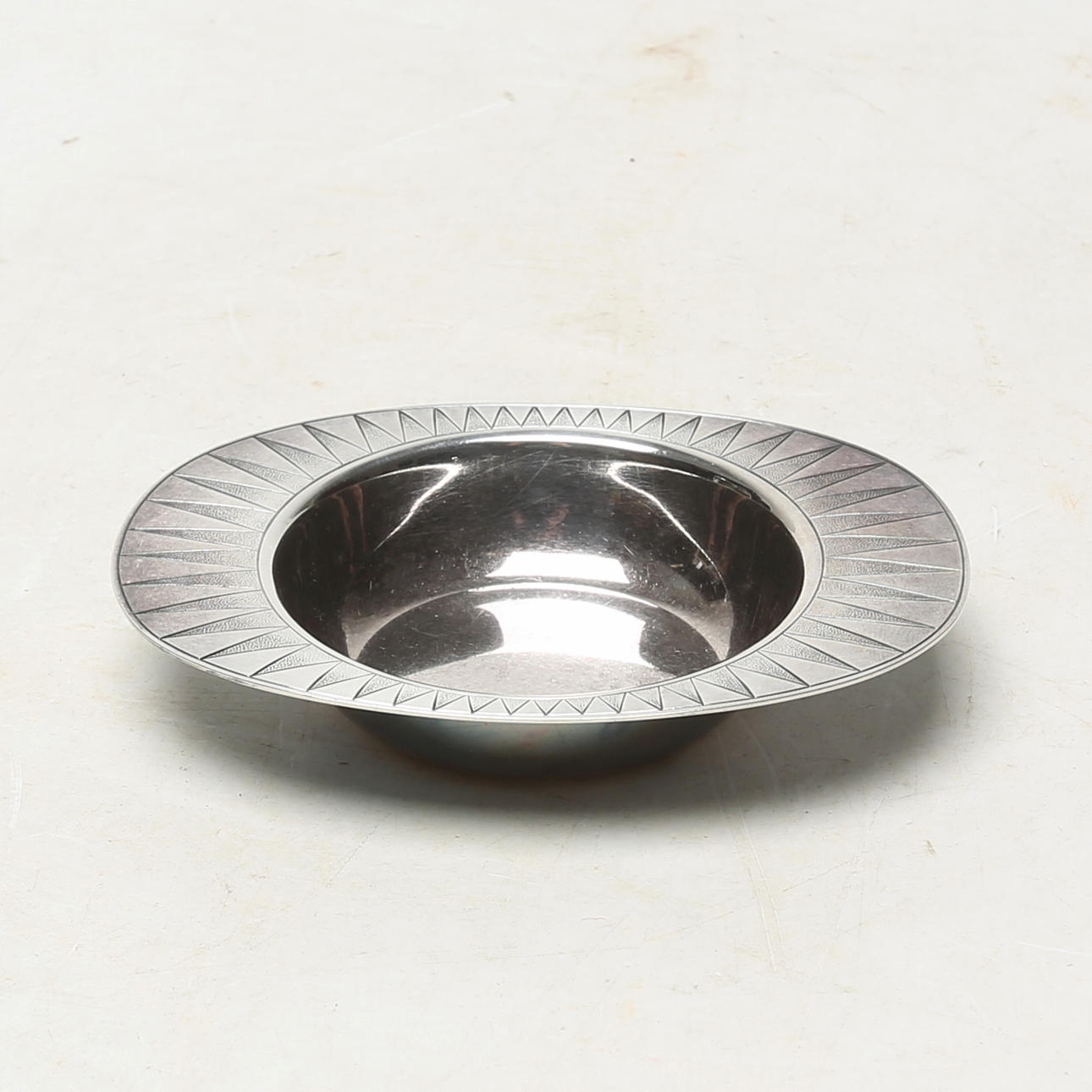 A bowl, silver.