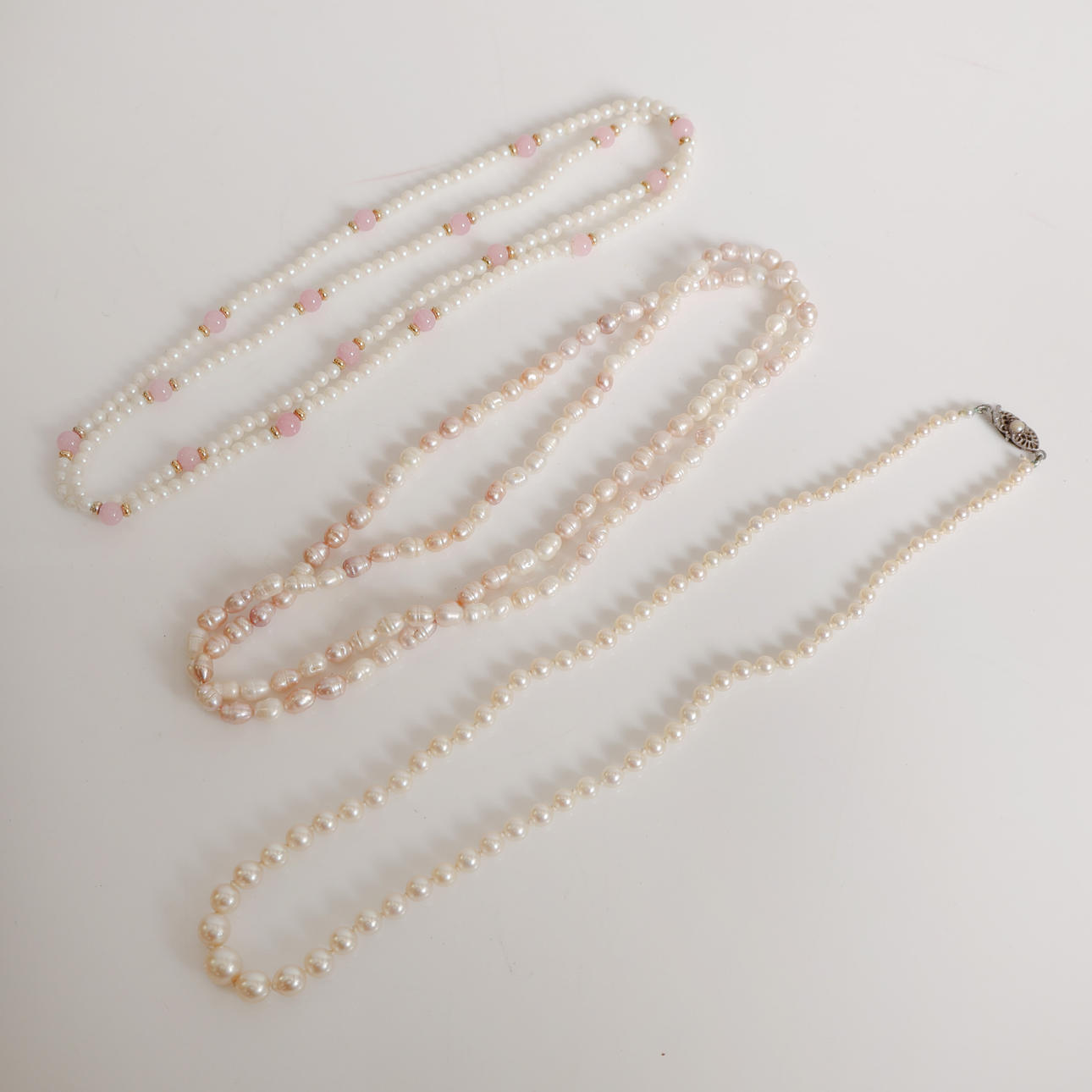 THREE PEARL NECKLACES (3).