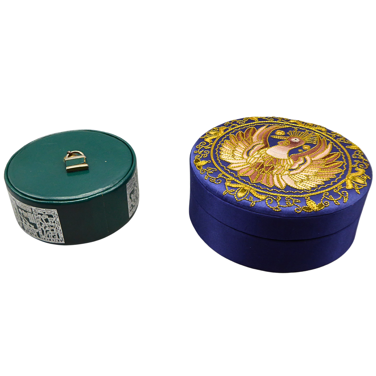 TWO ROUND STORAGE BOXES IN DIFFERENT DESIGNS.