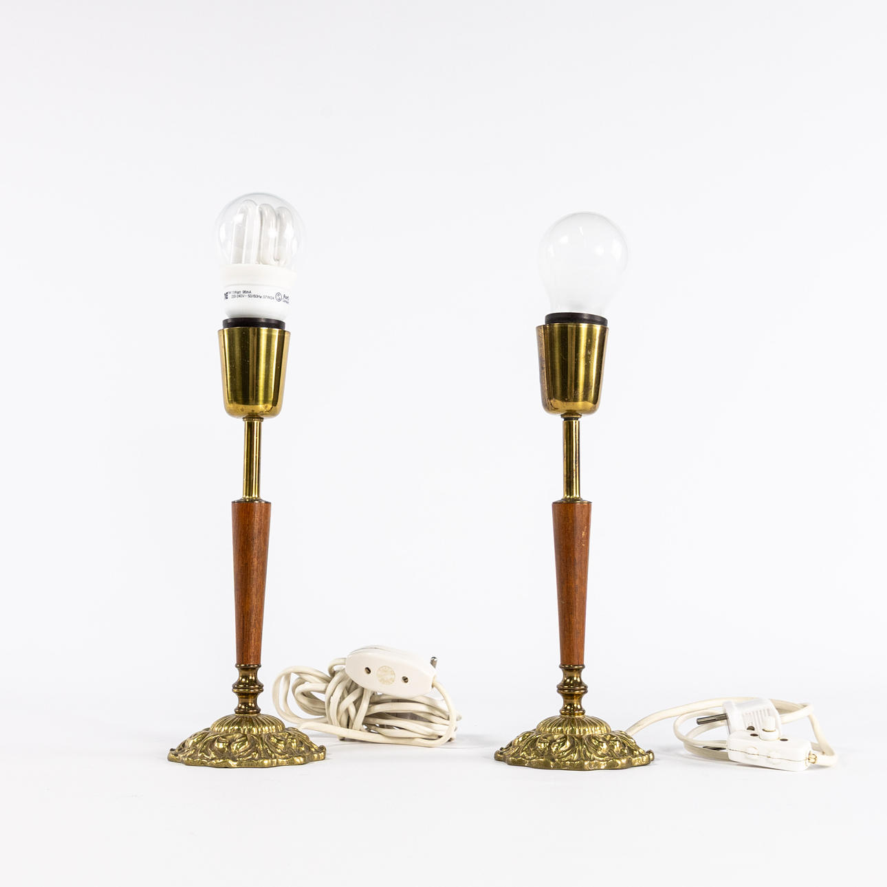 TABLE LAMPS, a pair, brass/teak, height 36 cm.