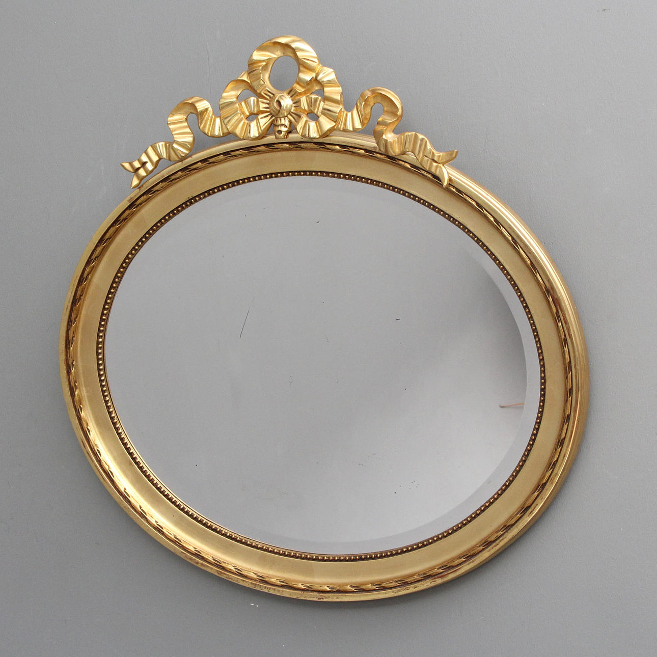 A Gustavian-style mirror, 20th century.