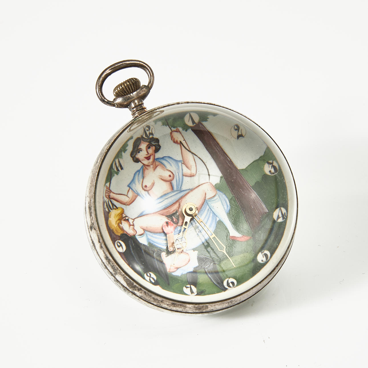 A 20th century erotic table clock marked Omega.