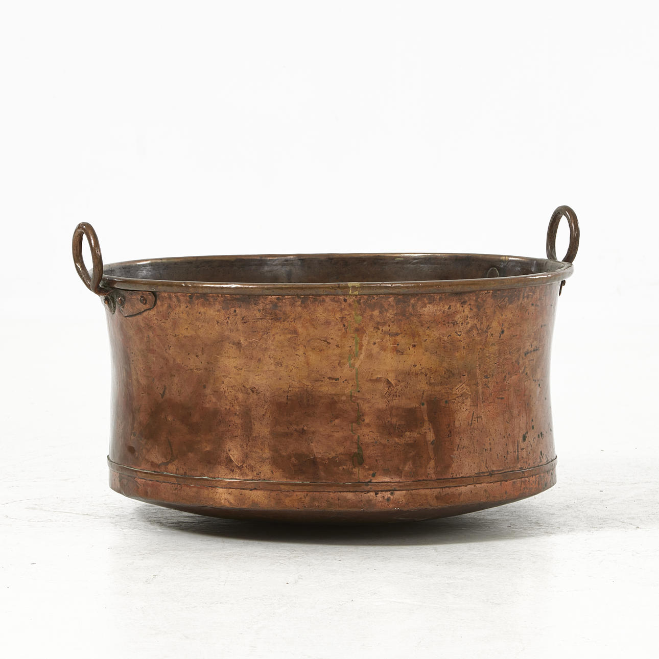 A 19th-century copper cauldron.