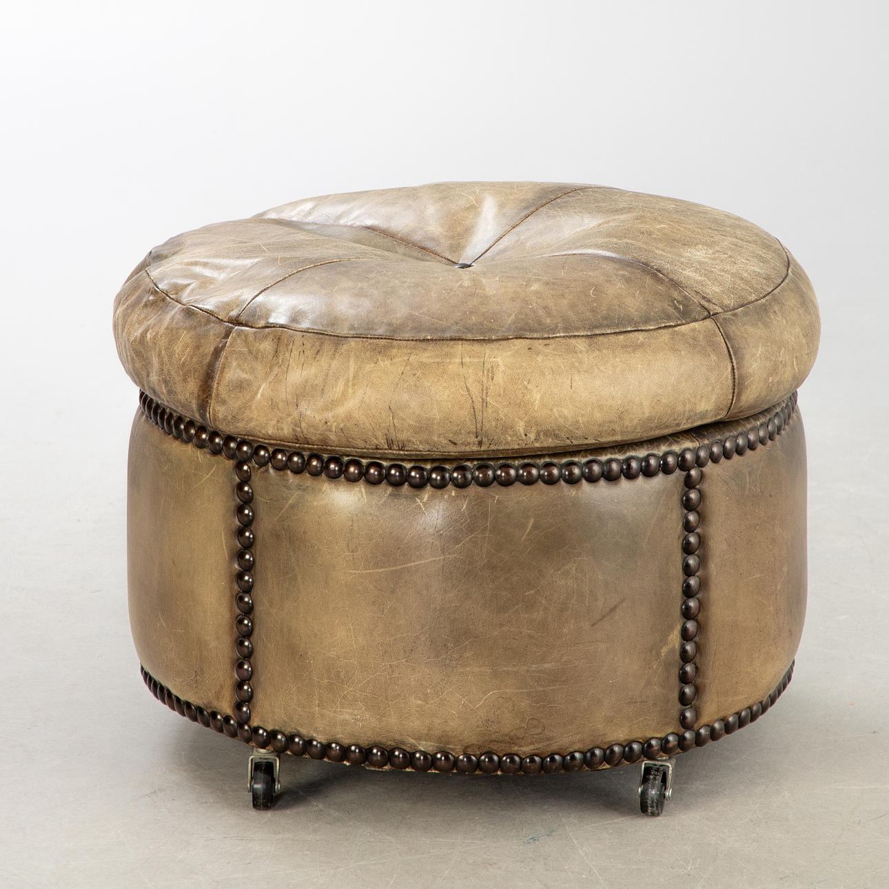 Leather pouf/stool, probably England, 2000s.
