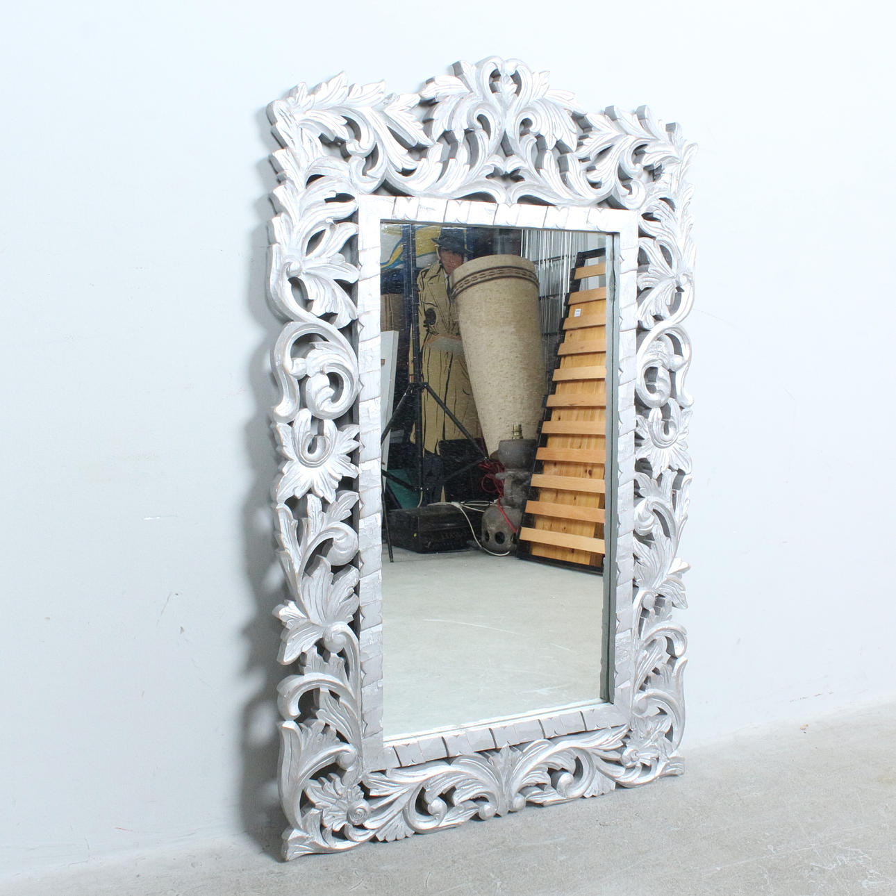 Mirror with wooden frame, painted silver.