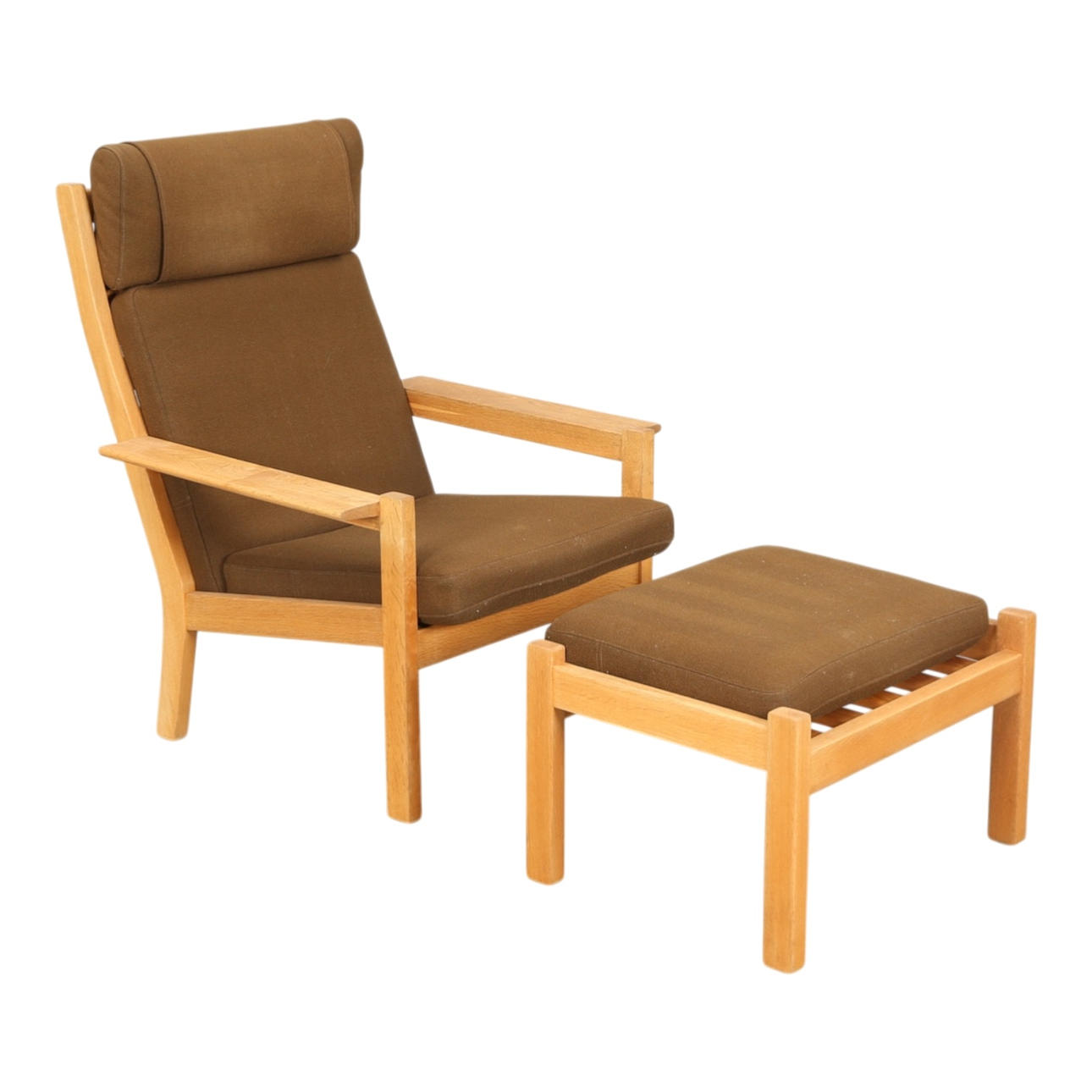 DANSK DESIGN. Armchair and stool, solid oak, 1970s (2).