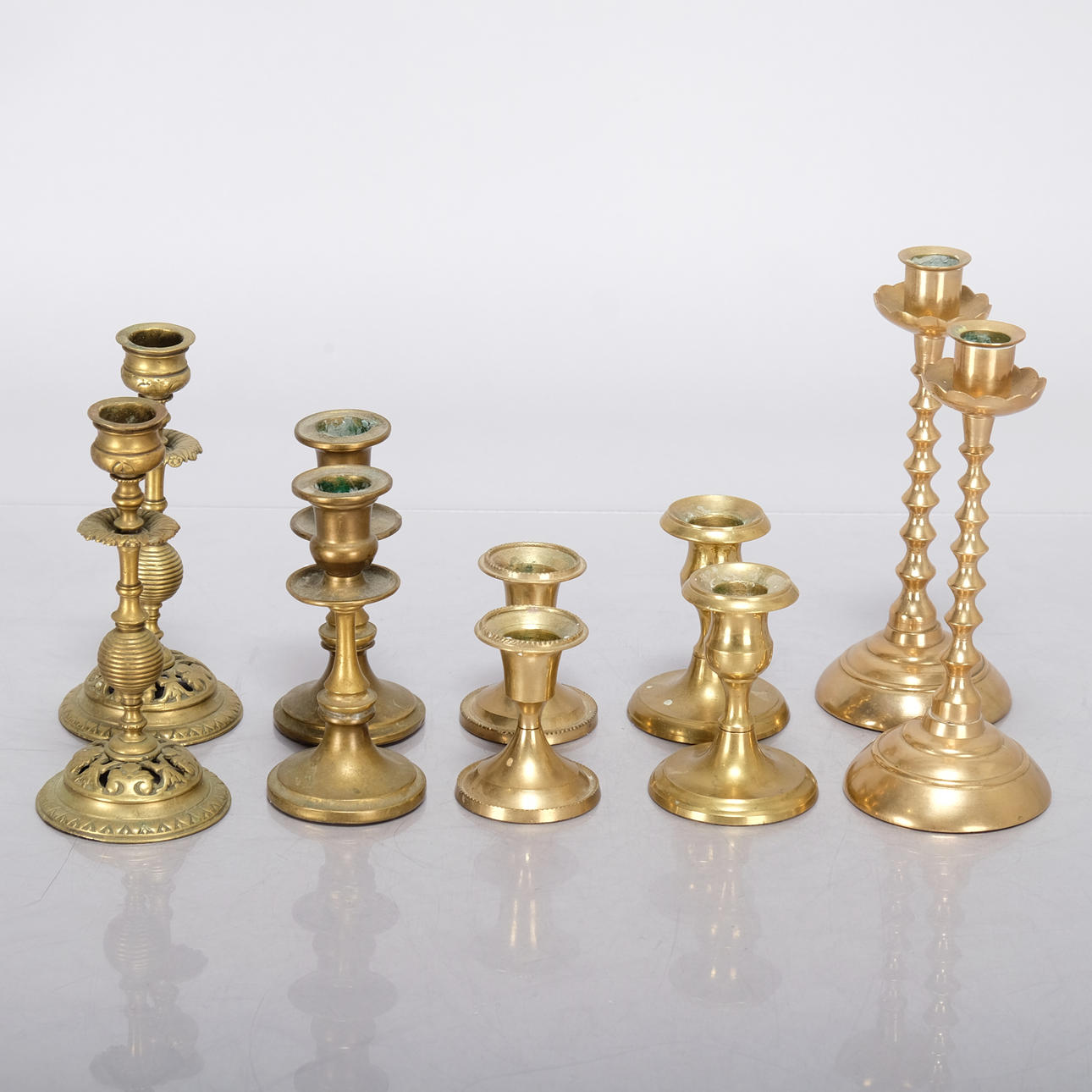 CANDLESTICKS, Brass, 10 pcs, various models.