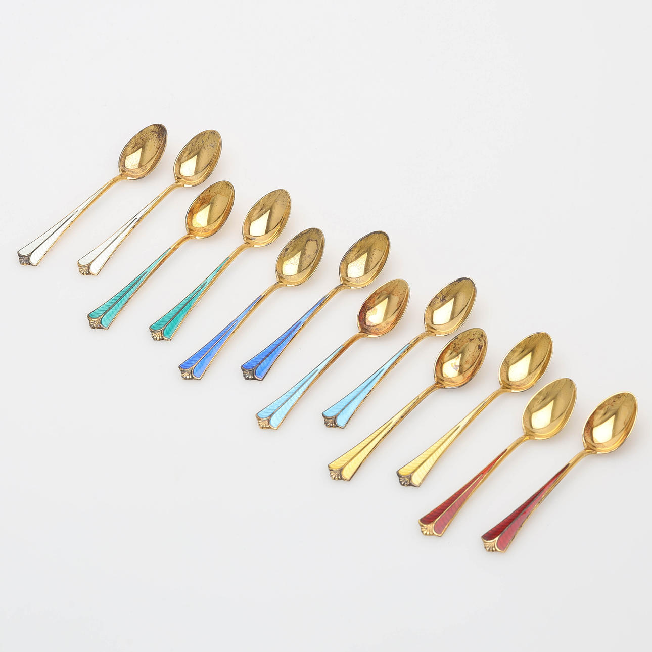 DAVID ANDERSEN. A set of 12 spoons, gold-plated sterling silver with ...