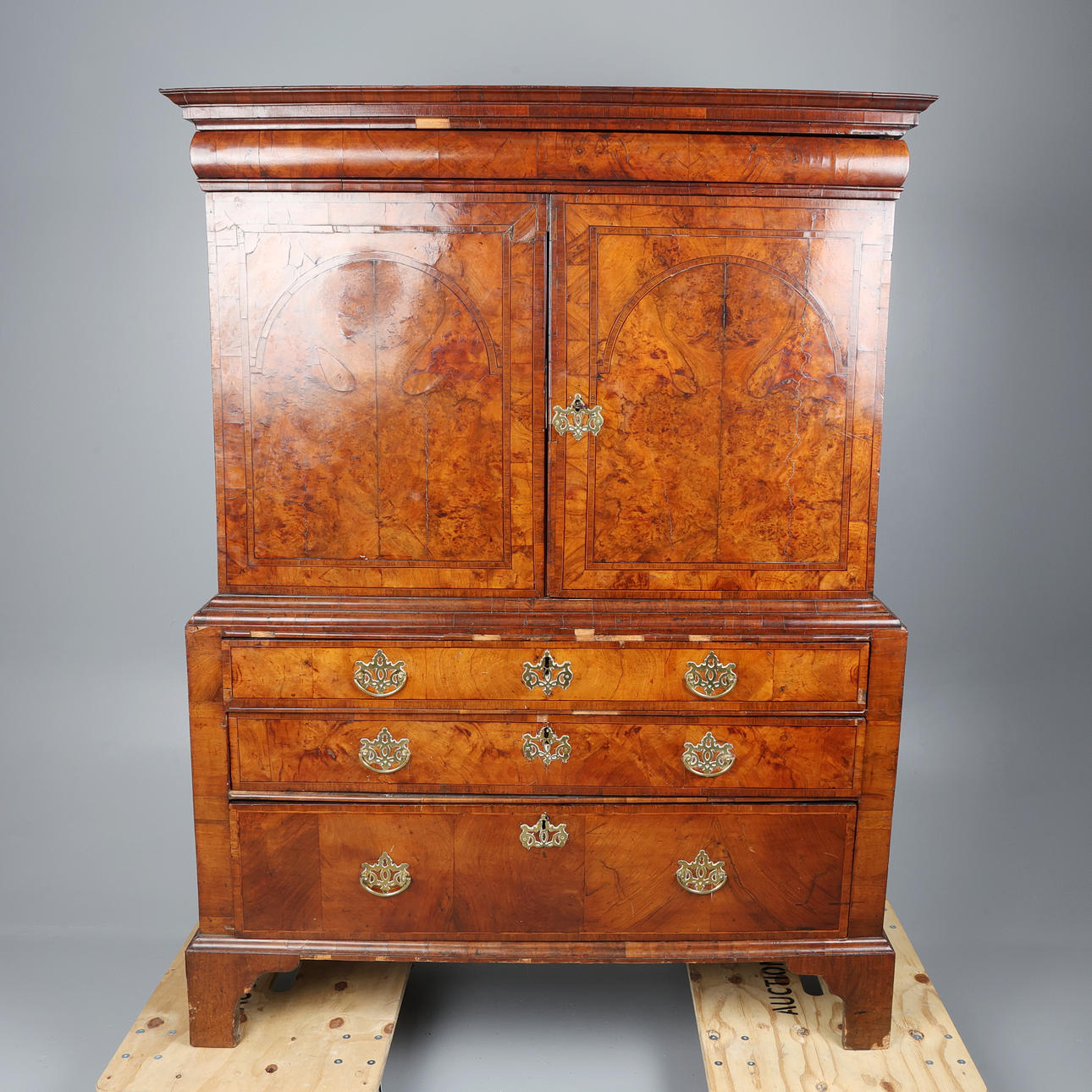 QUEEN ANNE FIGURED WALNUT CABINET ON CHEST.