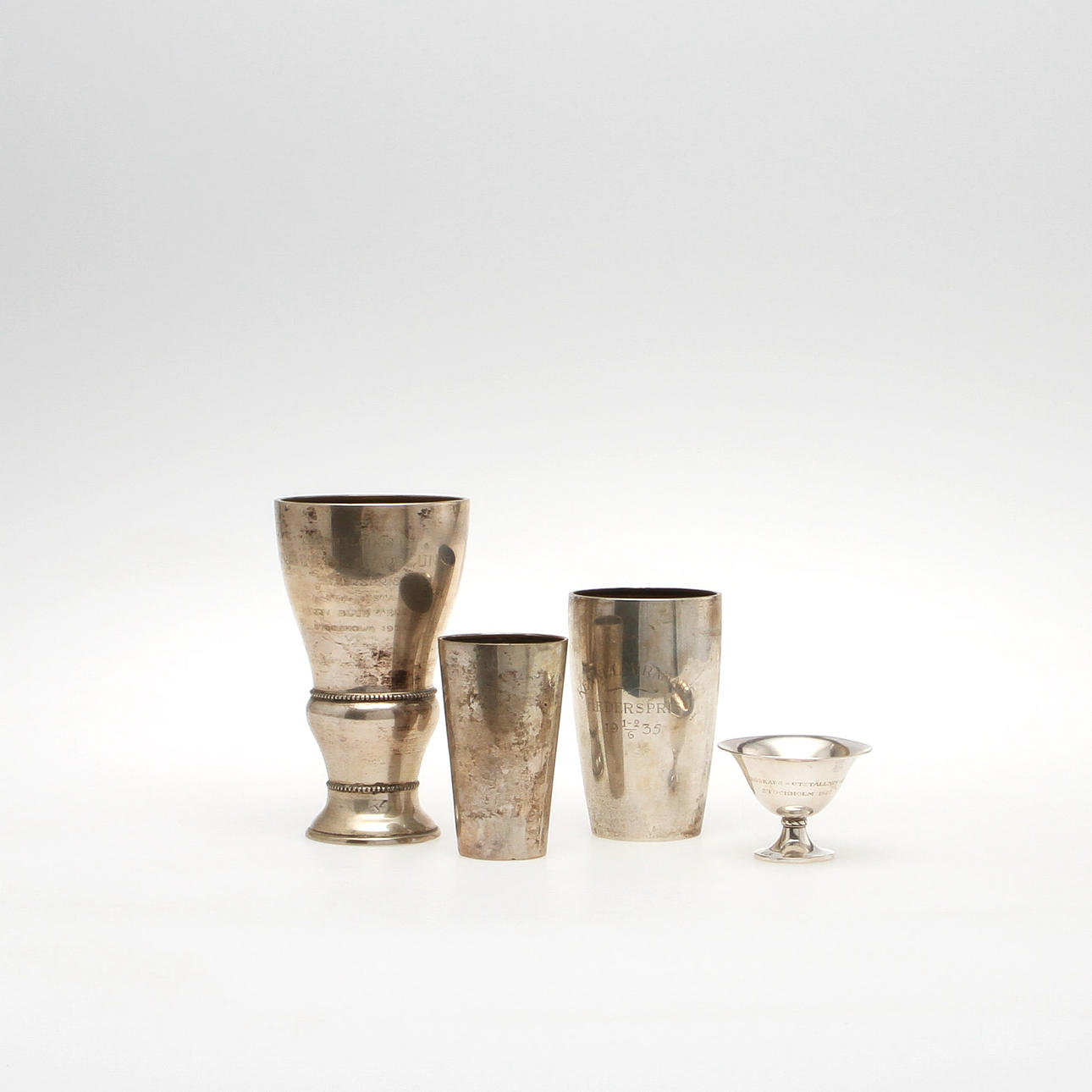 POKALER, 4 st, silver, K Anderson, W A Bolin samt H Karelfelt, Sverige. Vikt ca 460 gram.